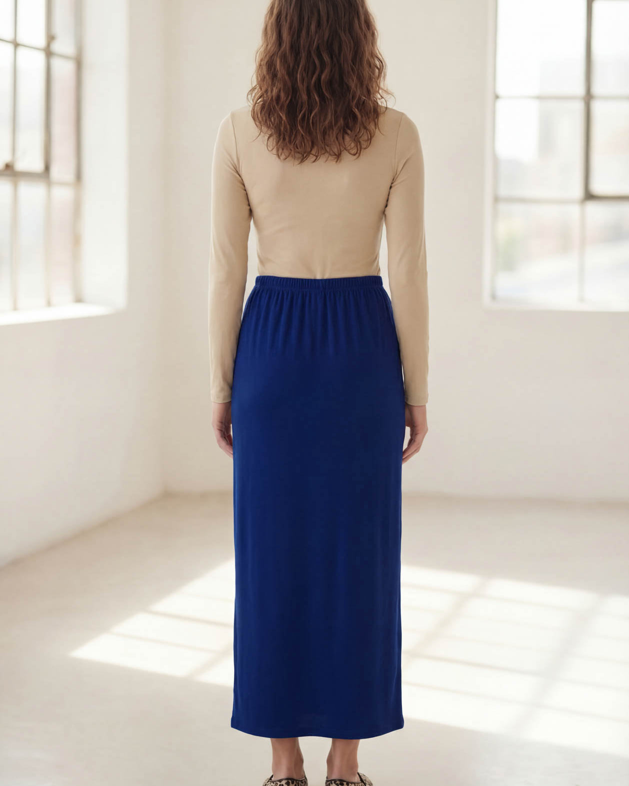 Model wearing Nuggles® 36" Classic Skirt in Dark Royal