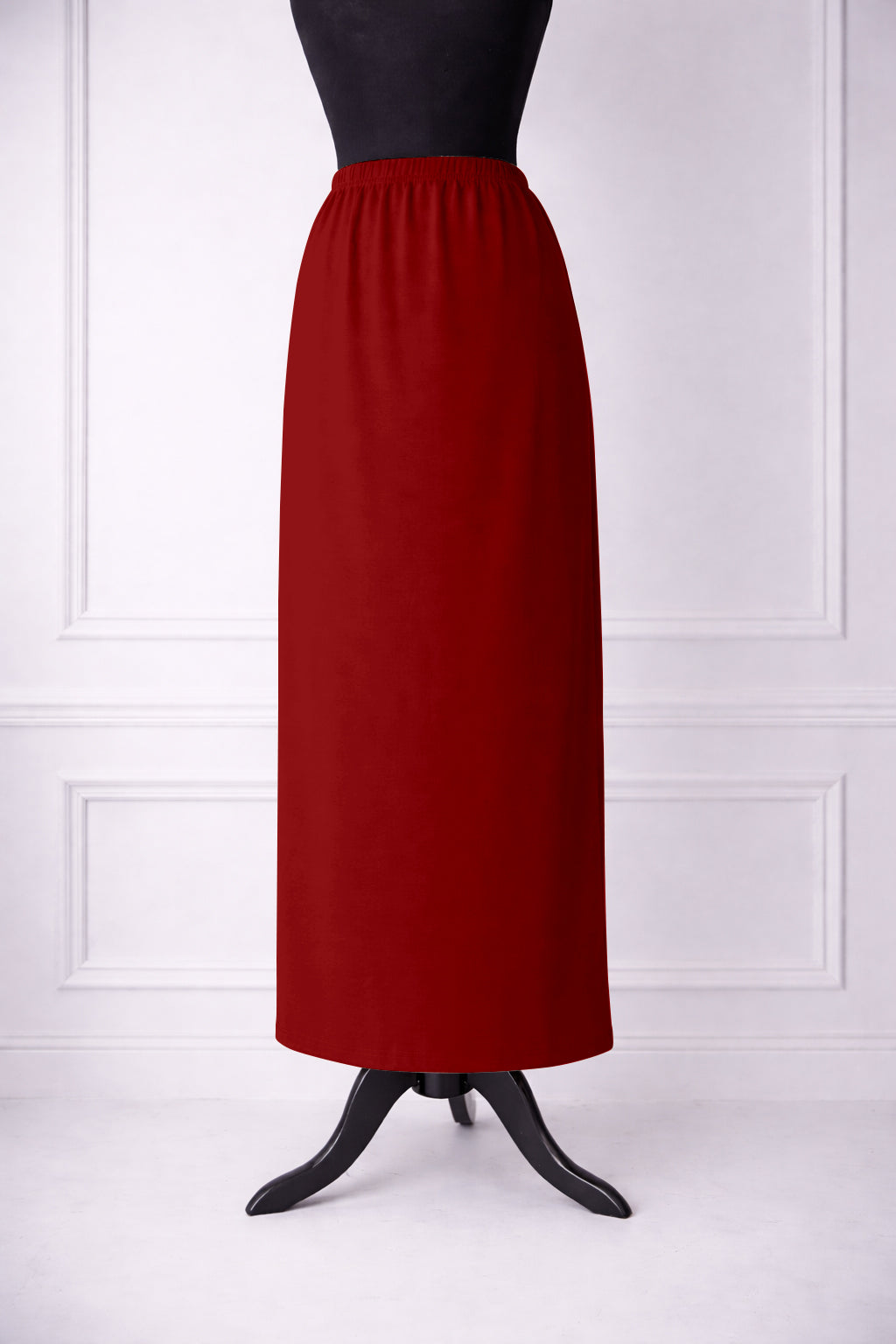 Stock photo of our Nuggles® 36-inch classic skirt elastic waistband and straight silhouette in Brick Red