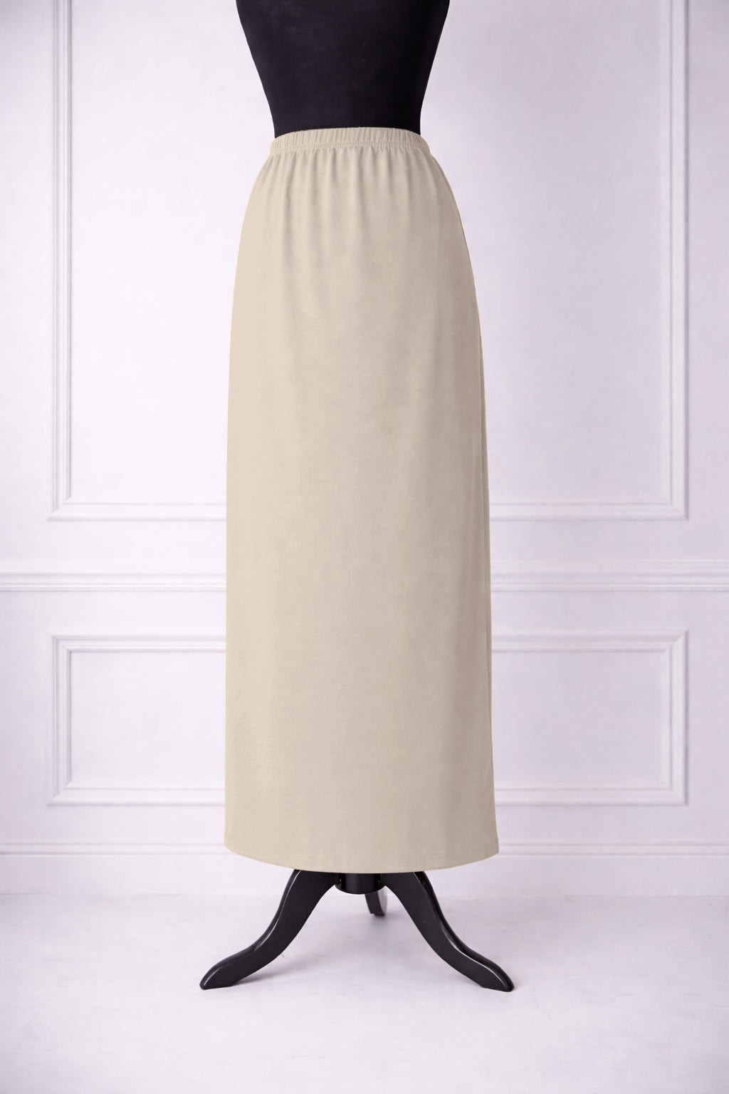 Stock photo of our Nuggles® 36-inch classic skirt elastic waistband and straight silhouette in Nude