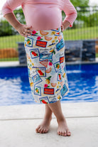 Girl wearing modest athletic sport skirt with attached leggings various colors and prints available.