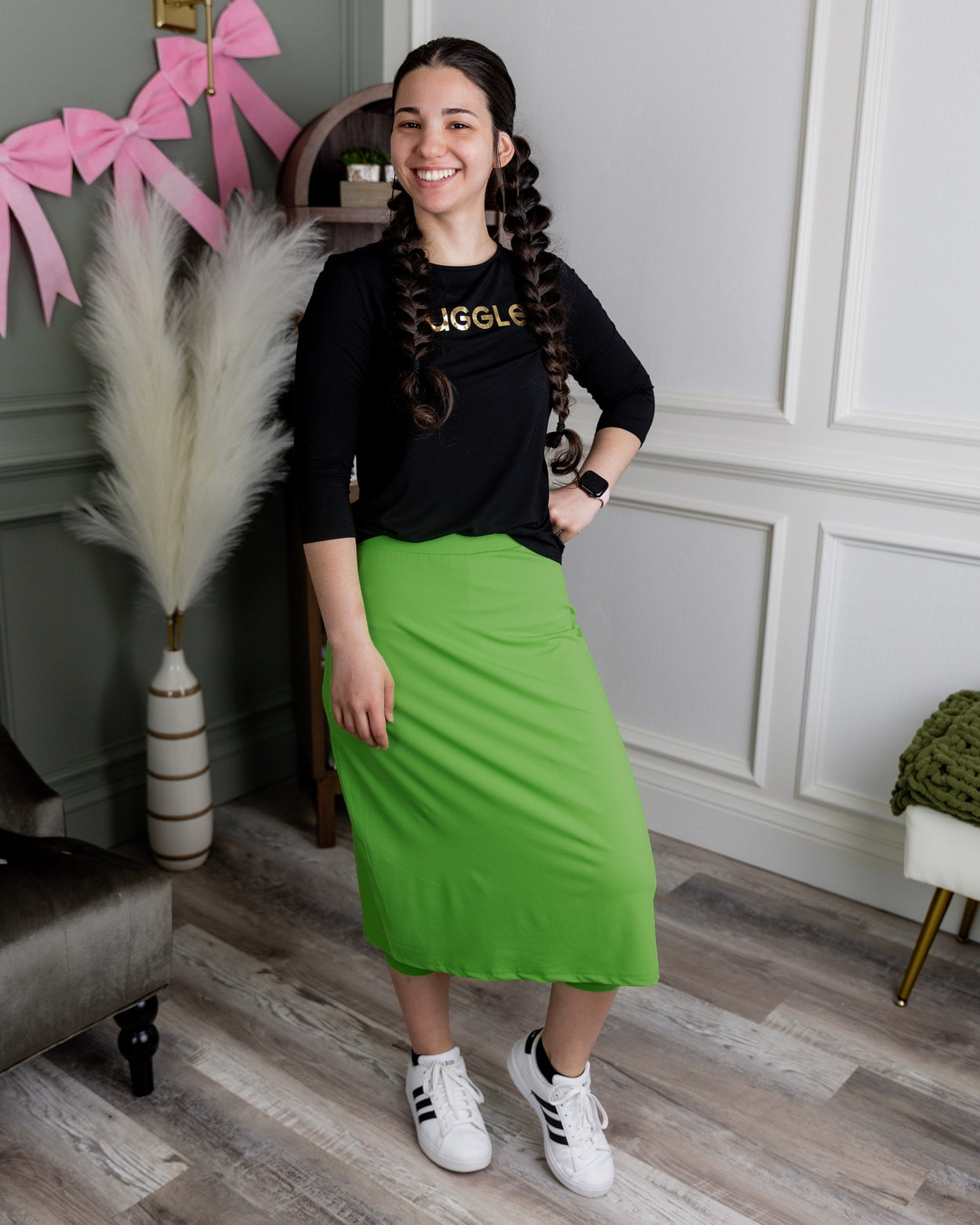 Model wearing Nuggles® 27" All-Sport Skirt in Green