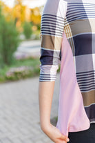 Model wearing the Adrielle Top with 3/4 sleeves and a classic skirt – modest women's top from Nuggles®