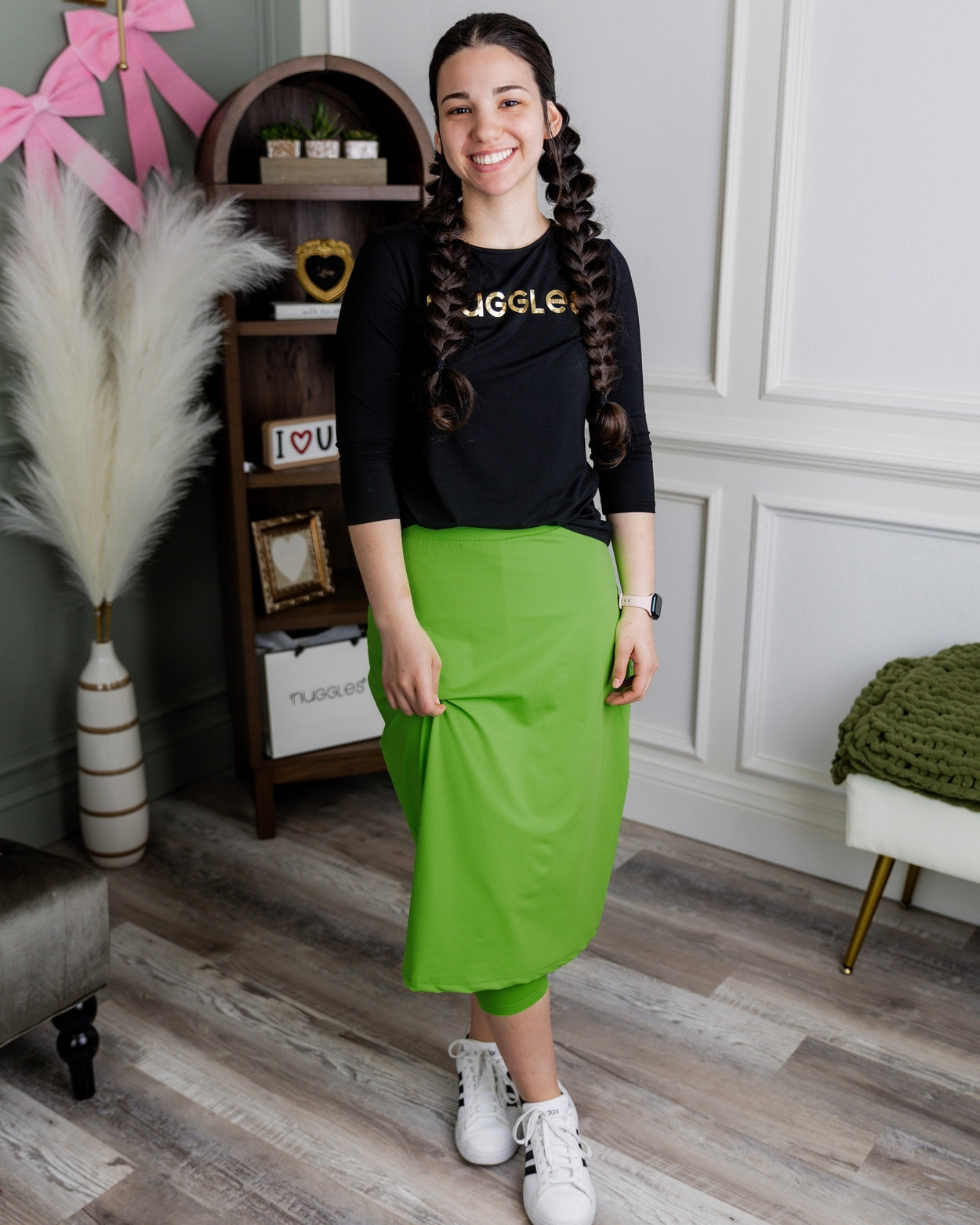 Model wearing Nuggles® 27" All-Sport Skirt in Green