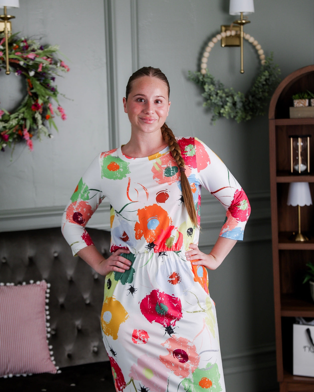 Model wearing Nuggles® Harper Jane Dress in Party Blooms