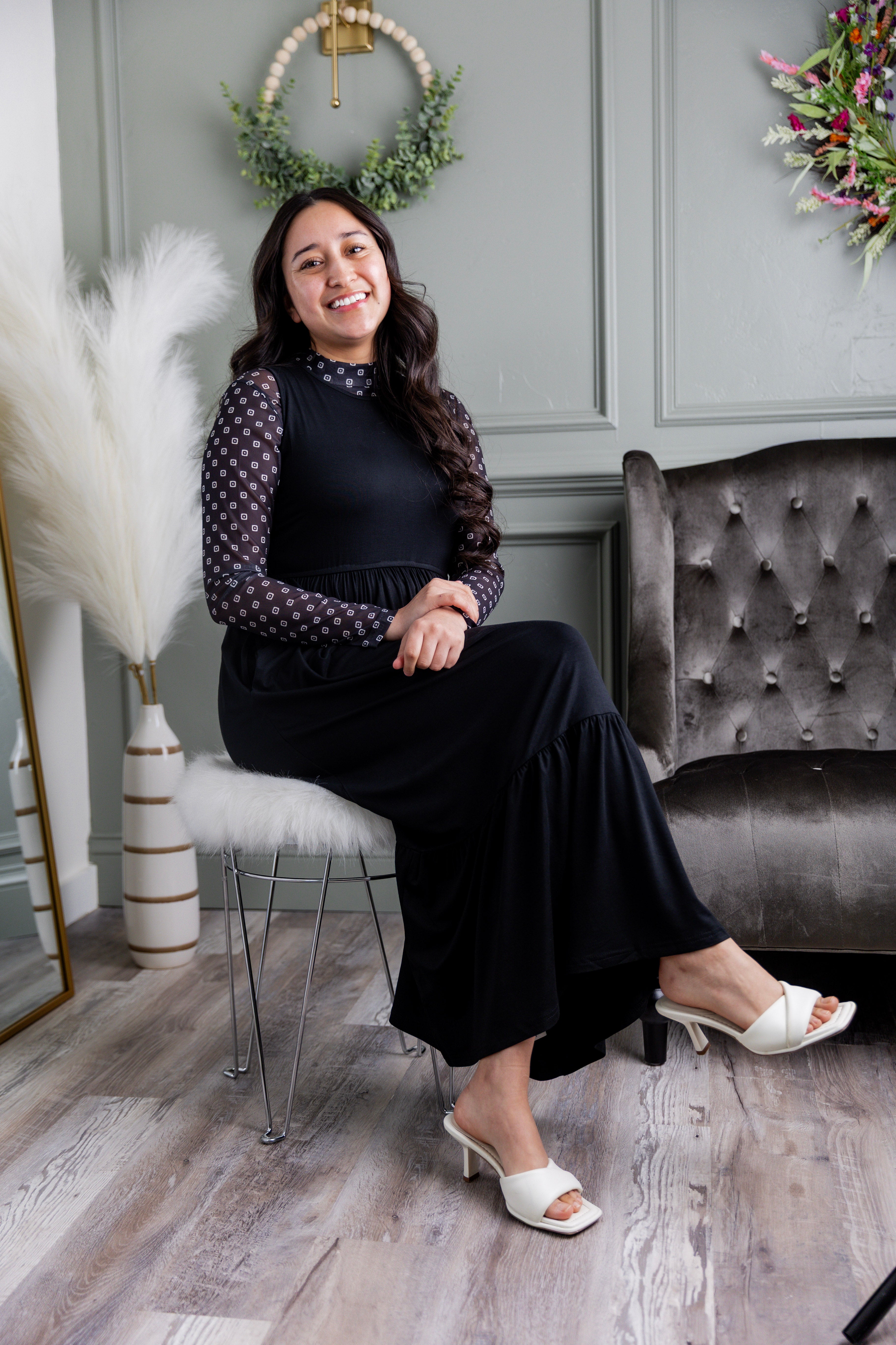 Model wearing the Nuggles® Riley Dress in Black