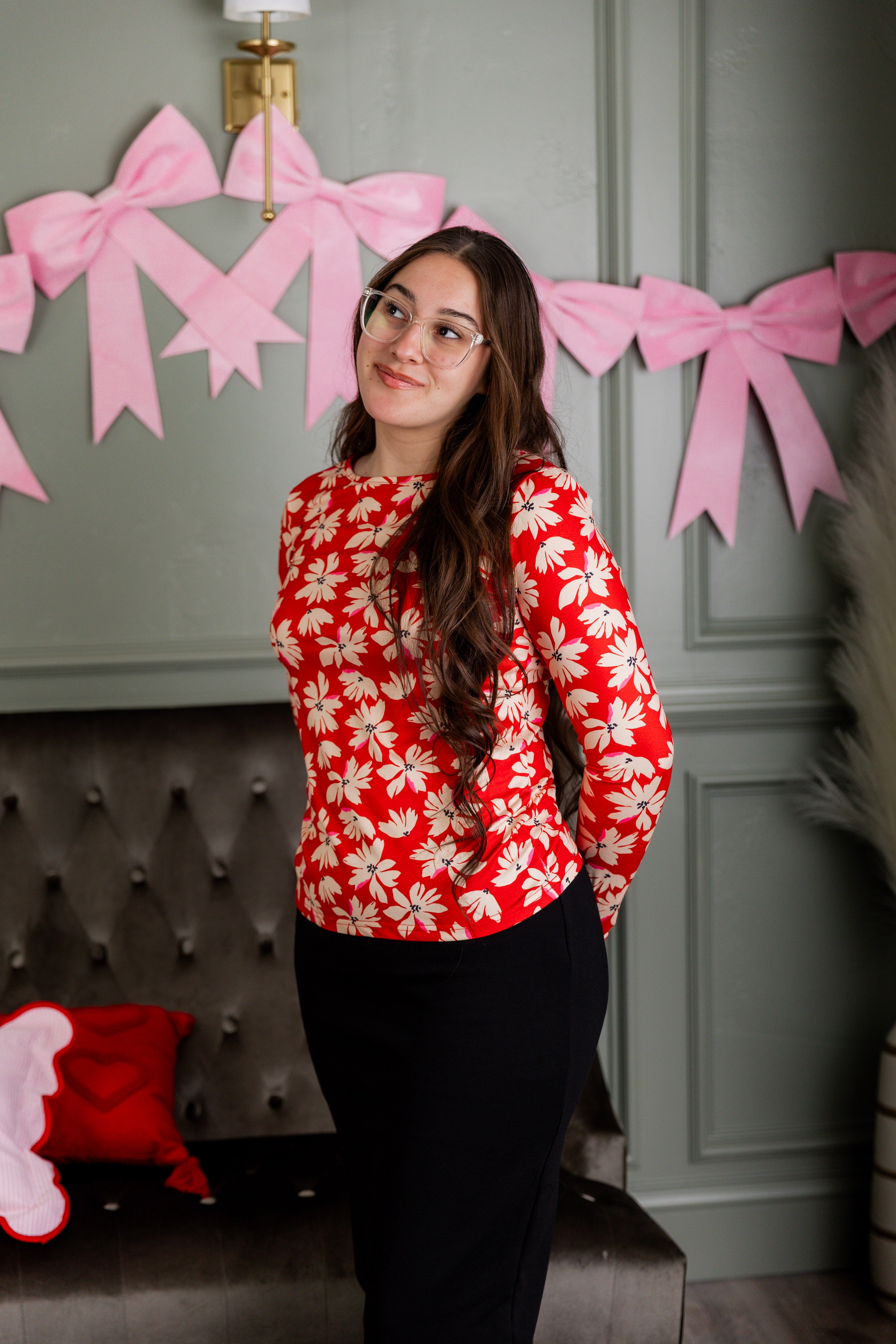 Model wearing Nuggles® Essential Long Sleeve Tee in Red Petal Party