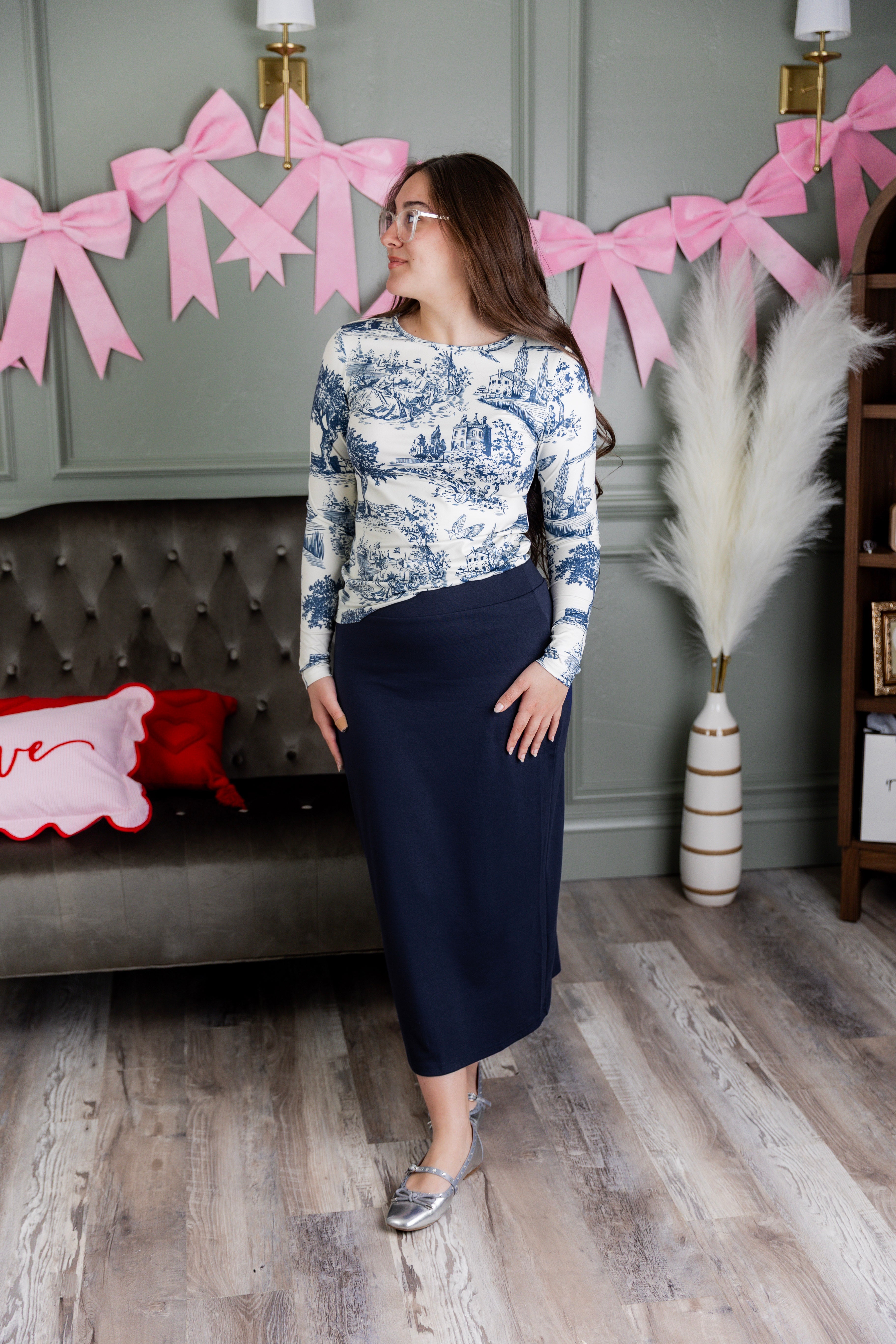 Model wearing Nuggles® 31" Relaxed Skirt in Navy