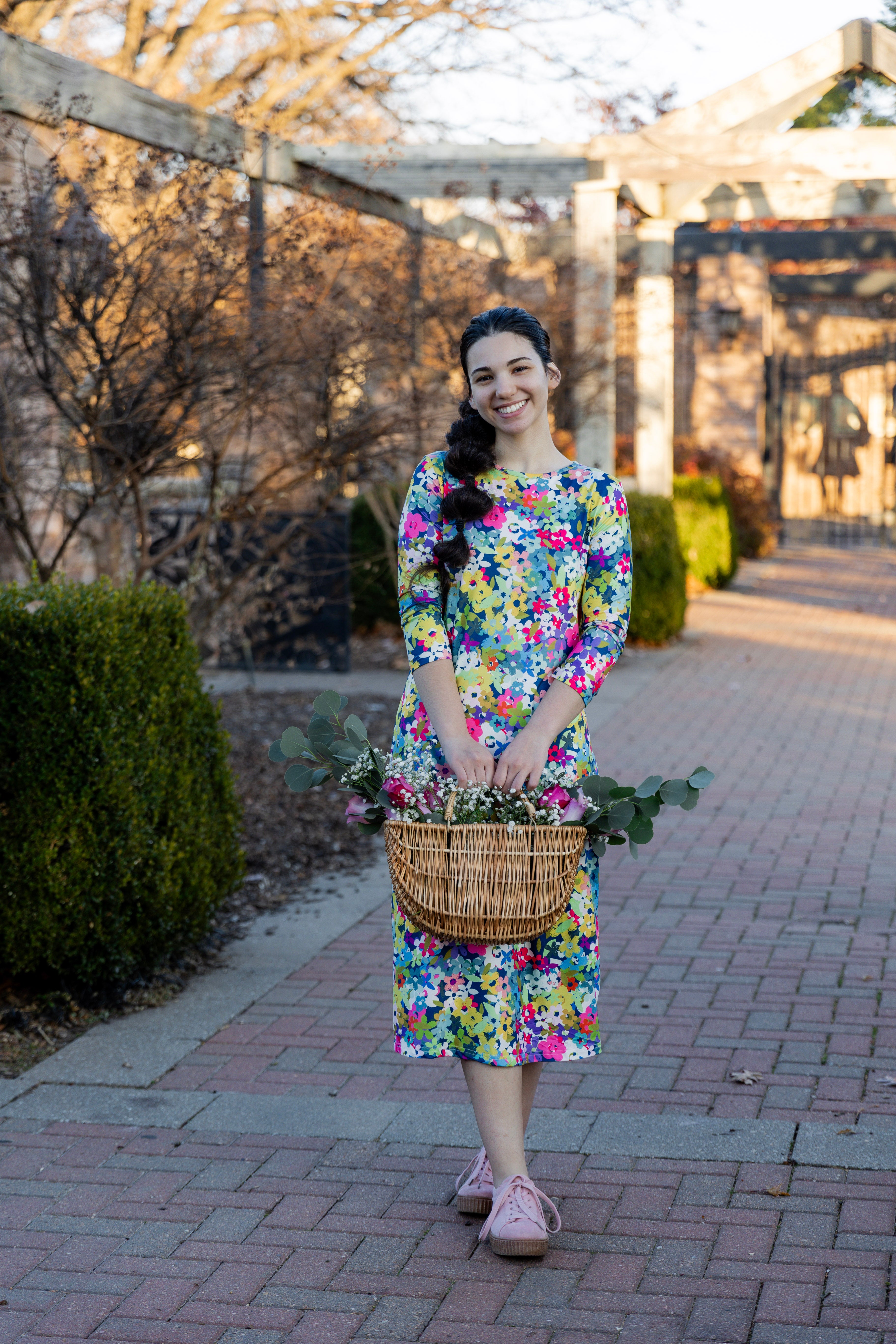 Model wearing the Nuggles® Original Midi Layering Dress in Wildflower Haze