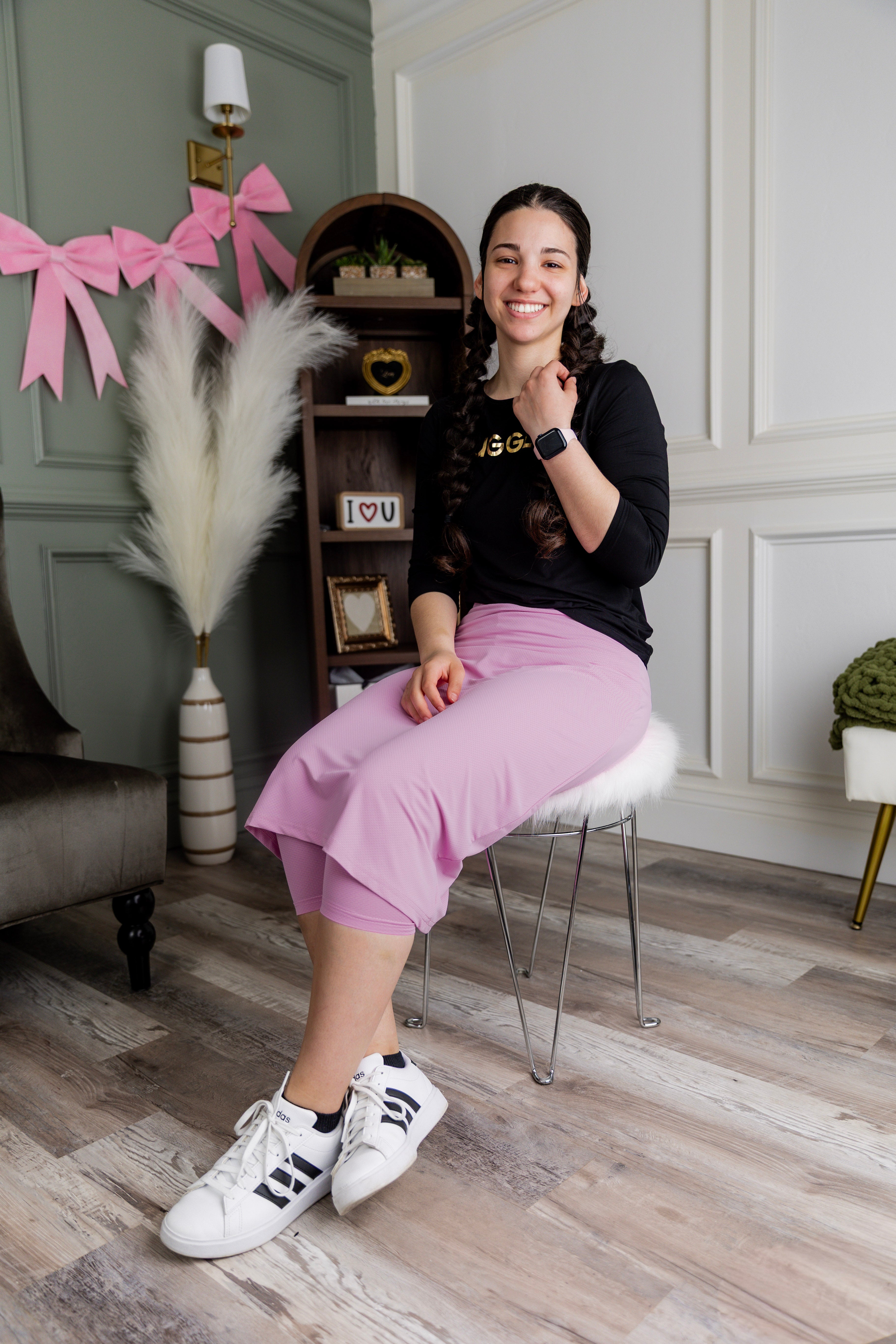 Model wearing Nuggles® 27" All-Sport Skirt in Pink