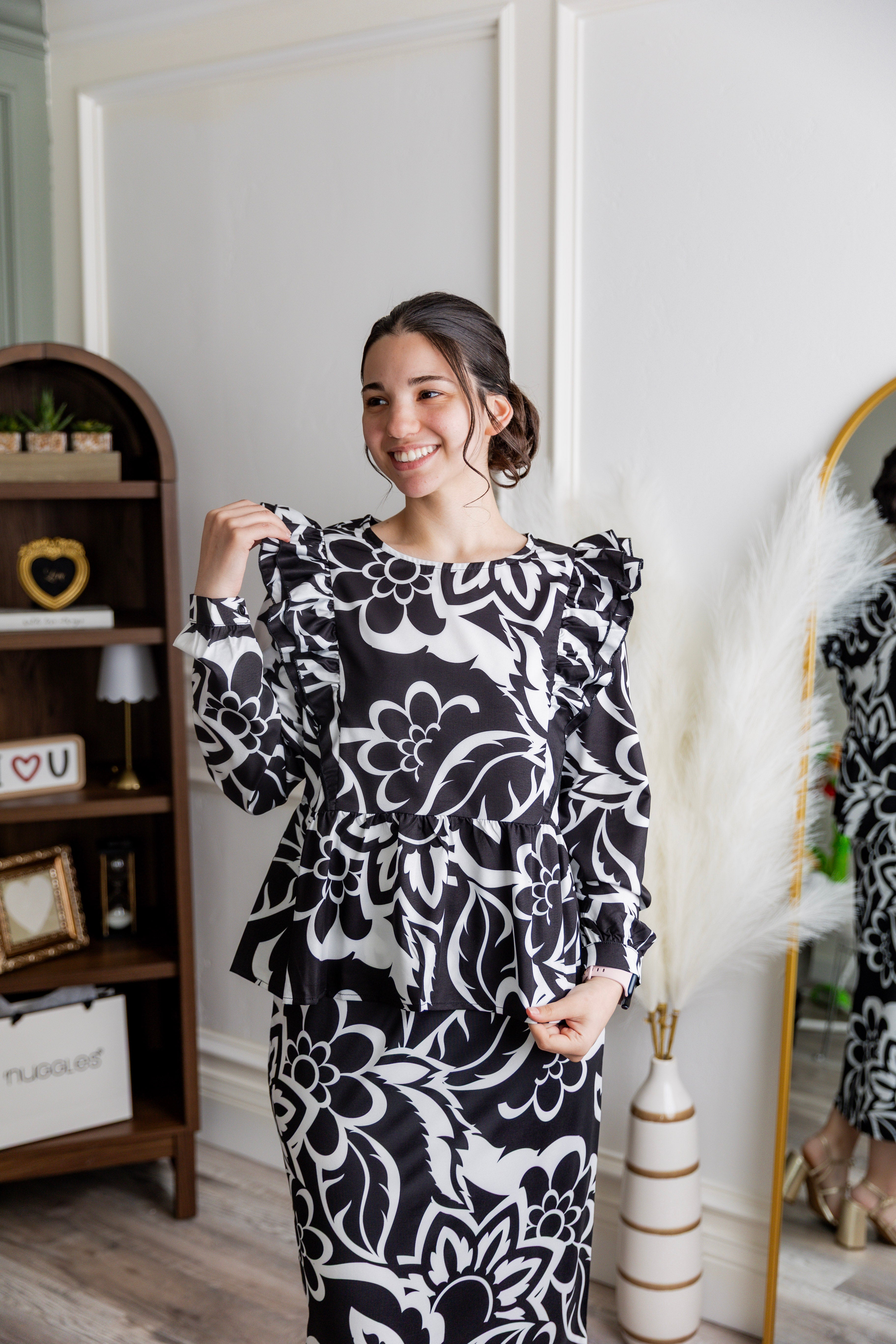 Model wearing Nuggles® Rae Top in Noir Floral