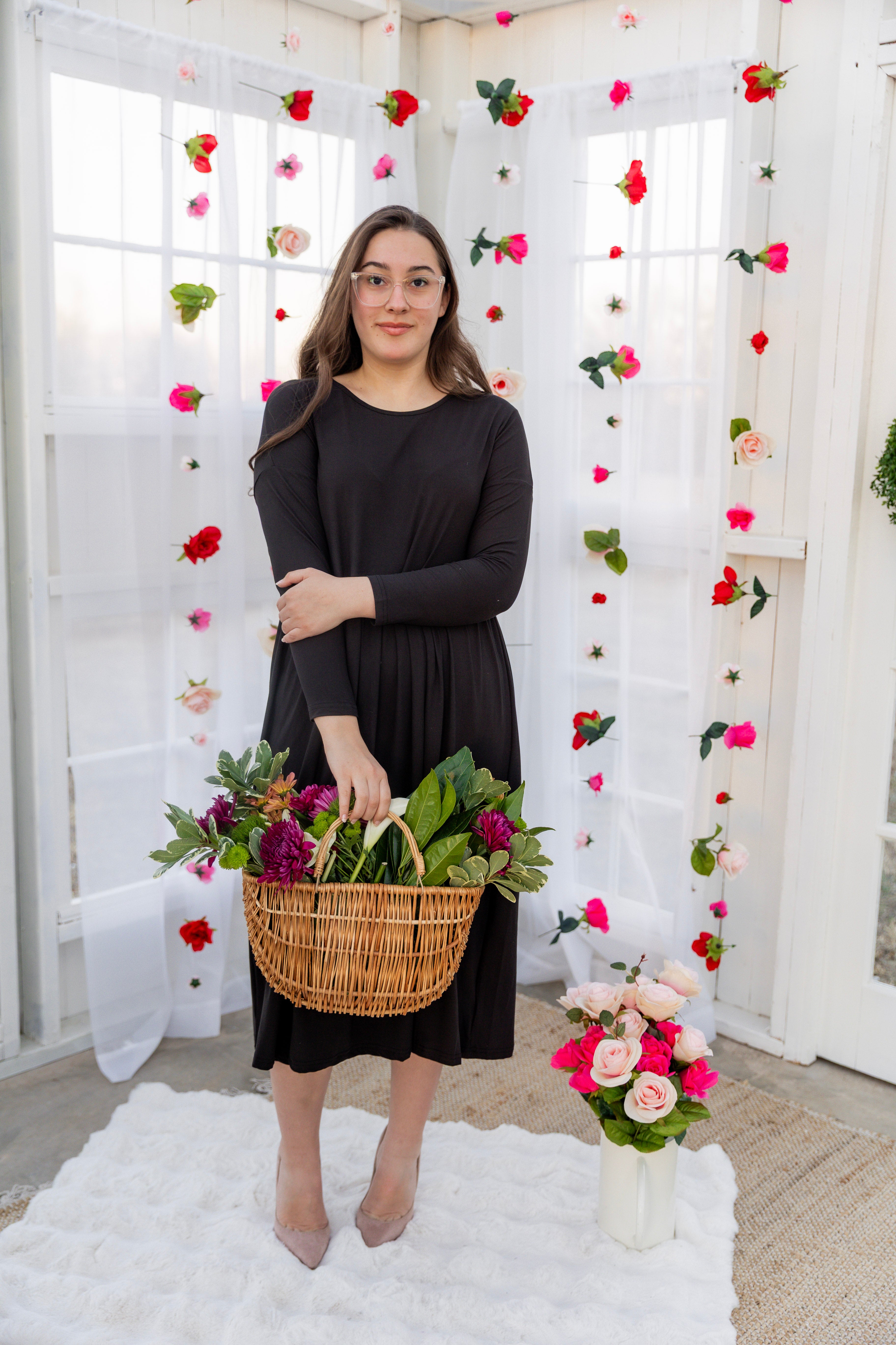 Model wearing the Nuggles® Farah Dress in Black