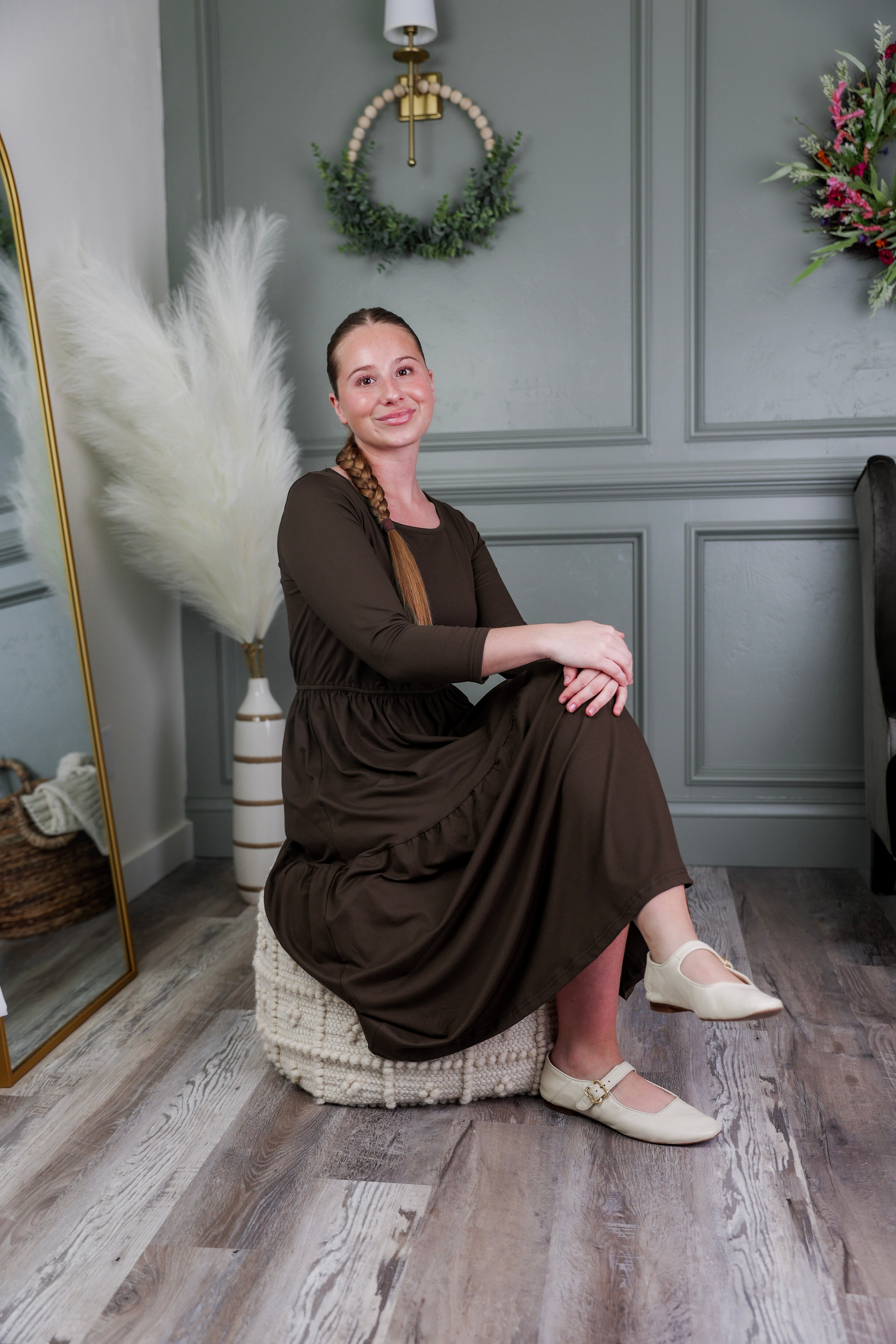 Model wearing Modest Nuggles® Nova Dress in Chocolate Brown