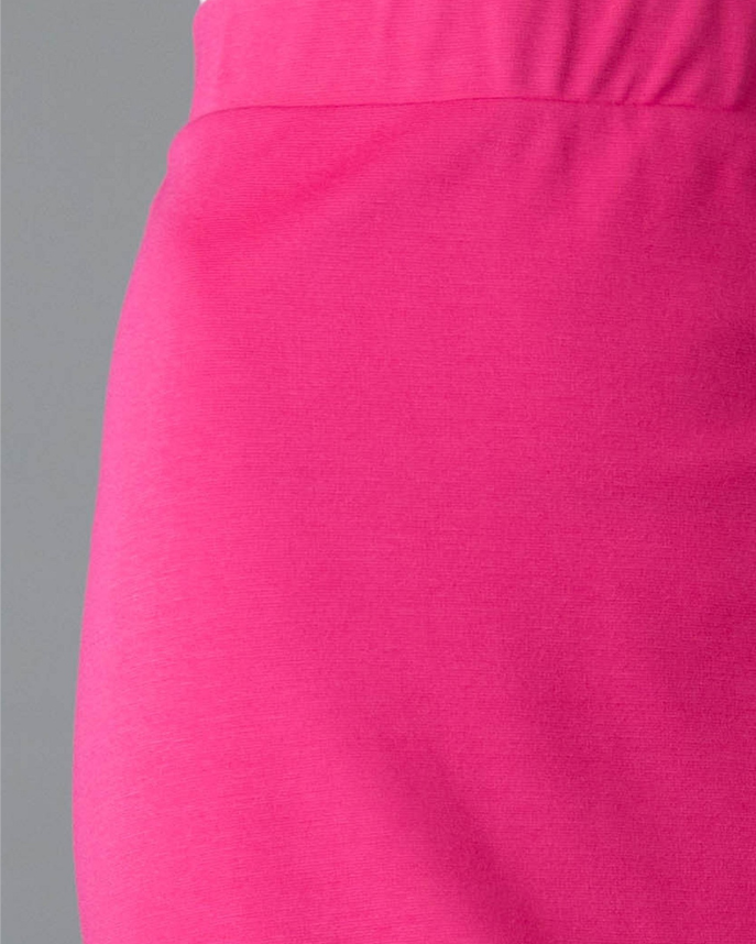 Model wearing Nuggles® Relaxed Midi Skirt in Pink