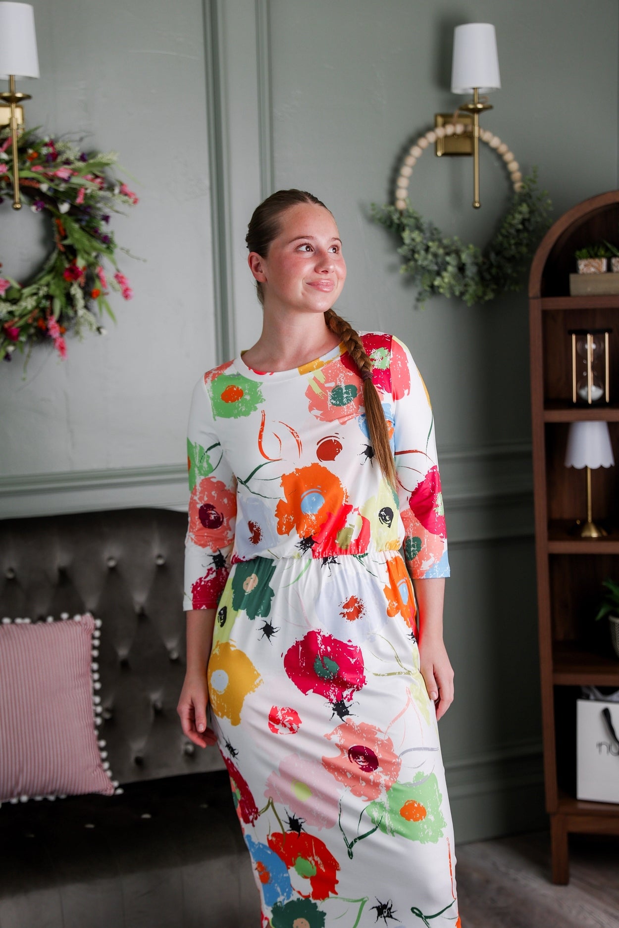 Model wearing Nuggles® Harper Jane Dress in Party Blooms