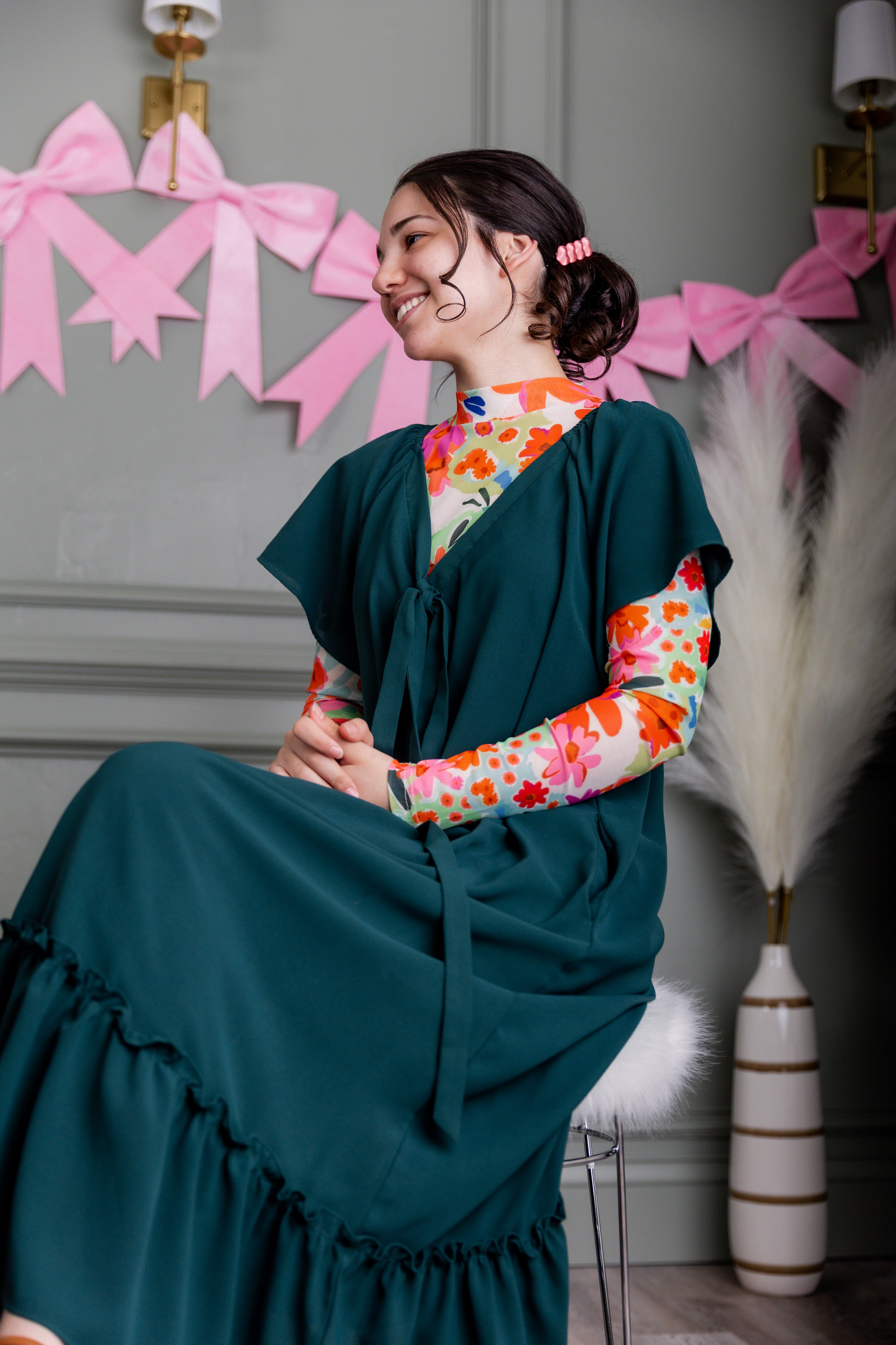 Model wearing Nuggles® Mesh Tee top in Confetti Bloom