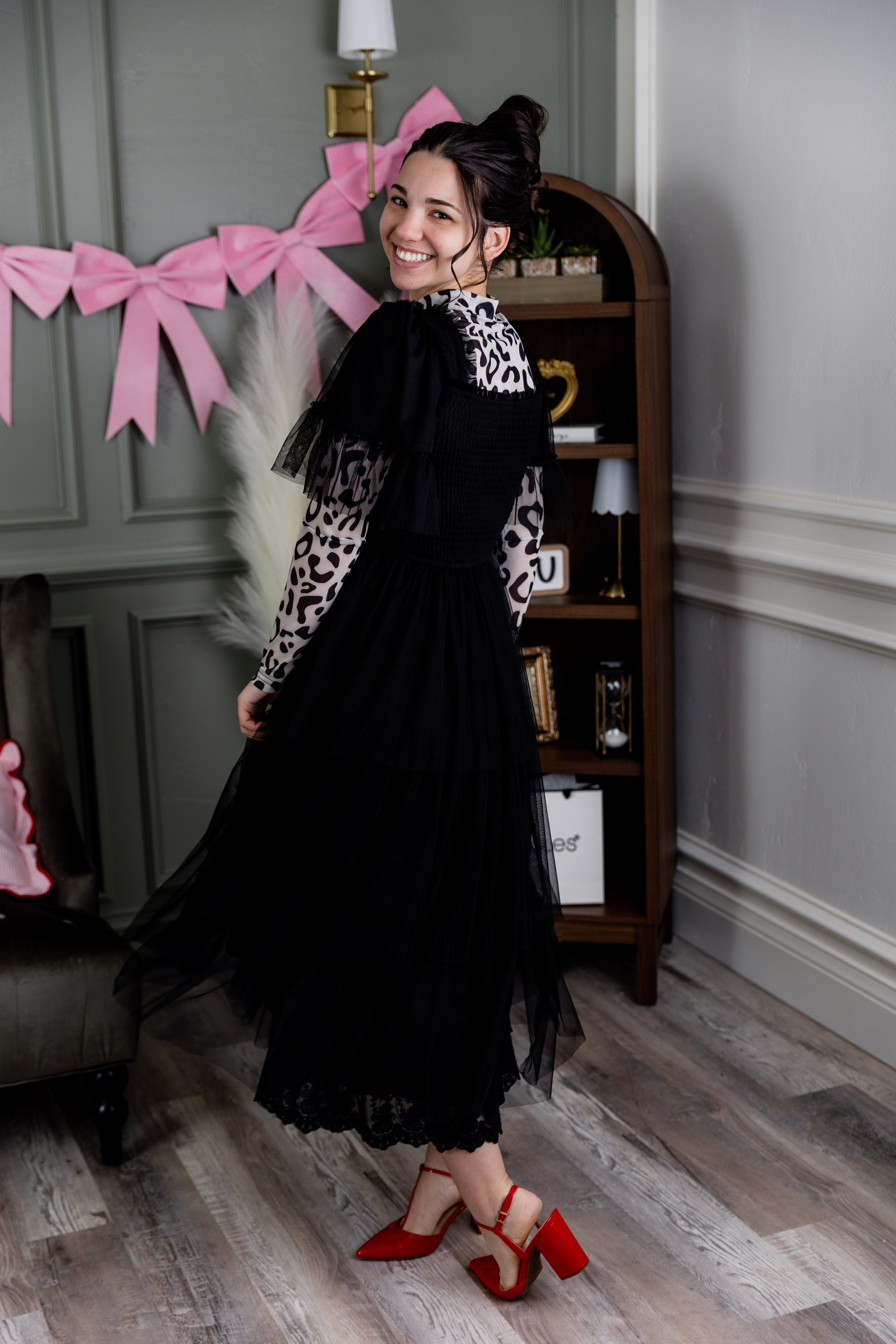 Model wearing Nuggles® Mesh Tee top in Snow Leopard