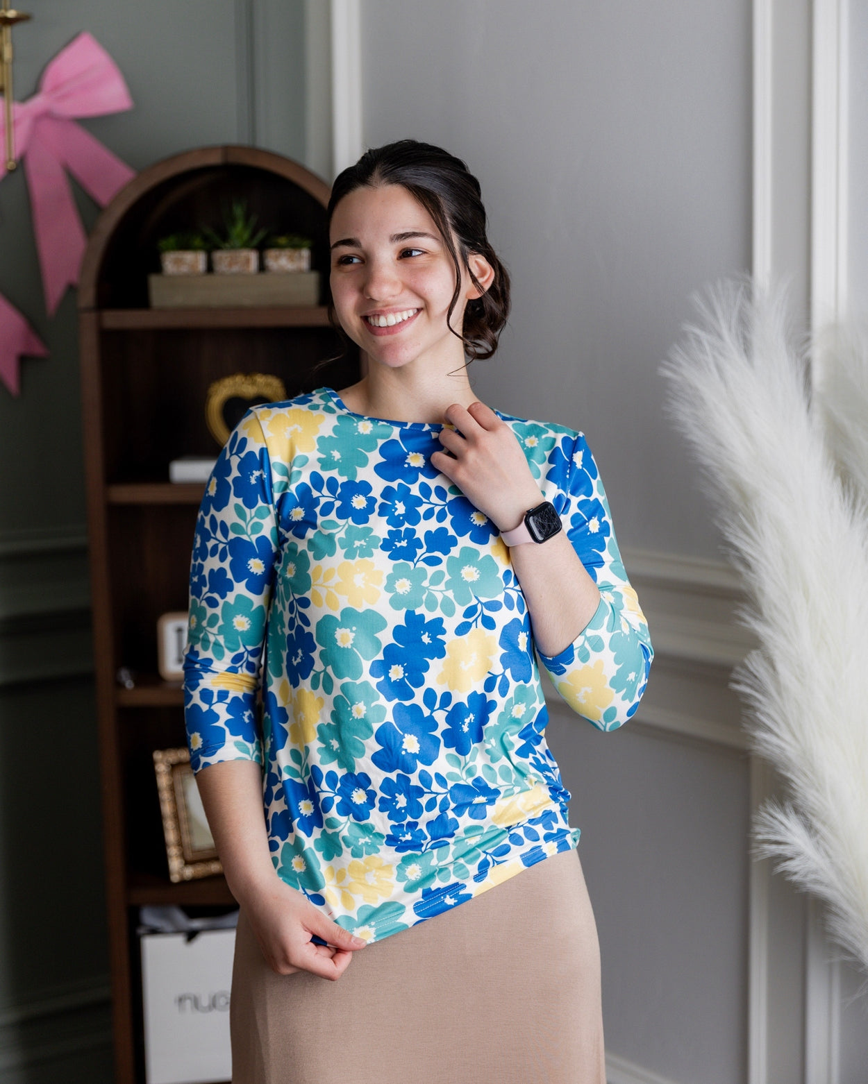 Model wearing Nuggles® 3/4 Essential Tee in Lakeside Garden