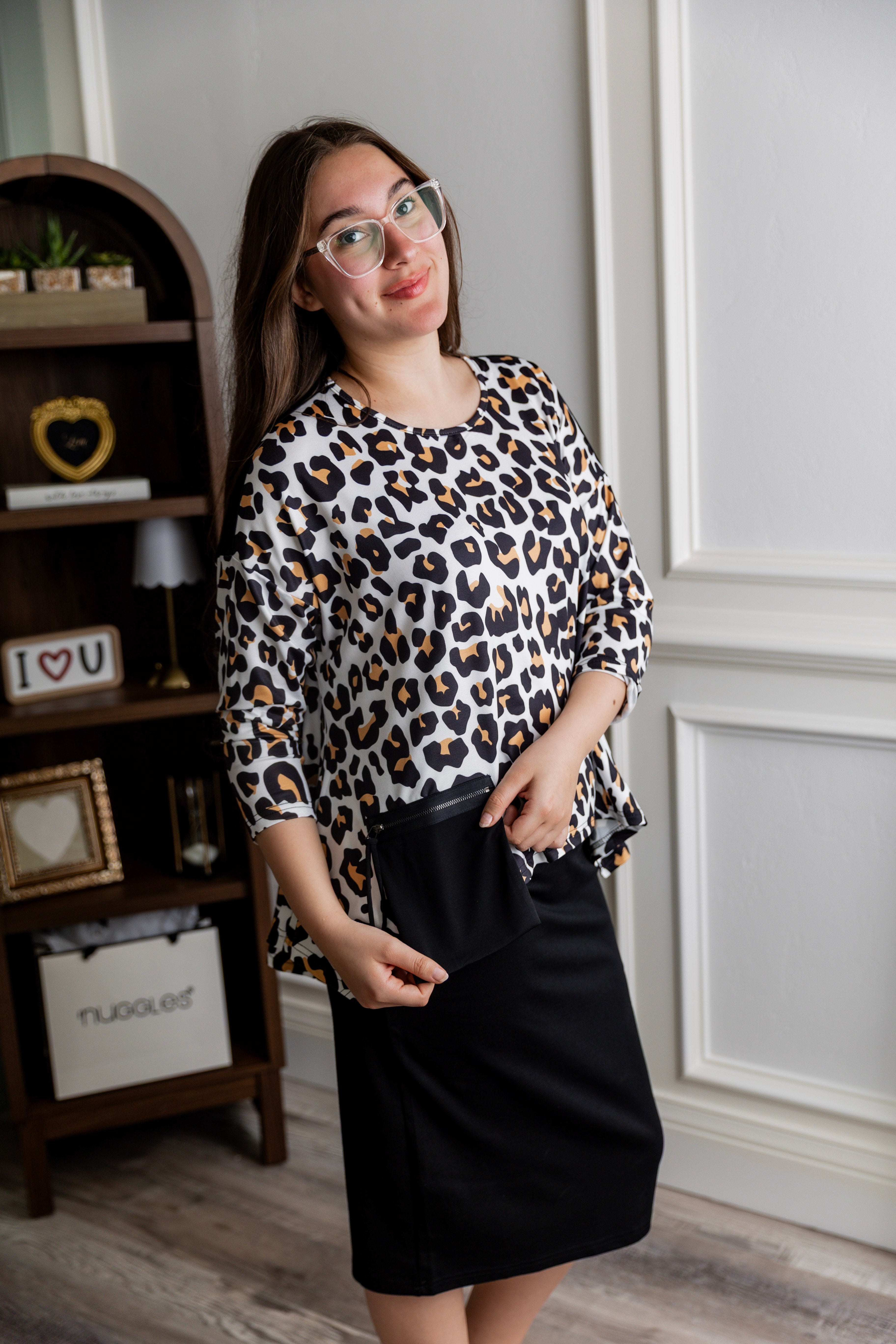 Model wearing the Nuggles® Keegan Top in Honey Leopard print modest boutique top