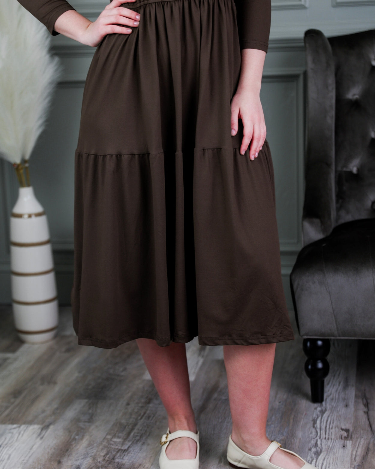 Model wearing Nuggles® Nova Dress in Brown