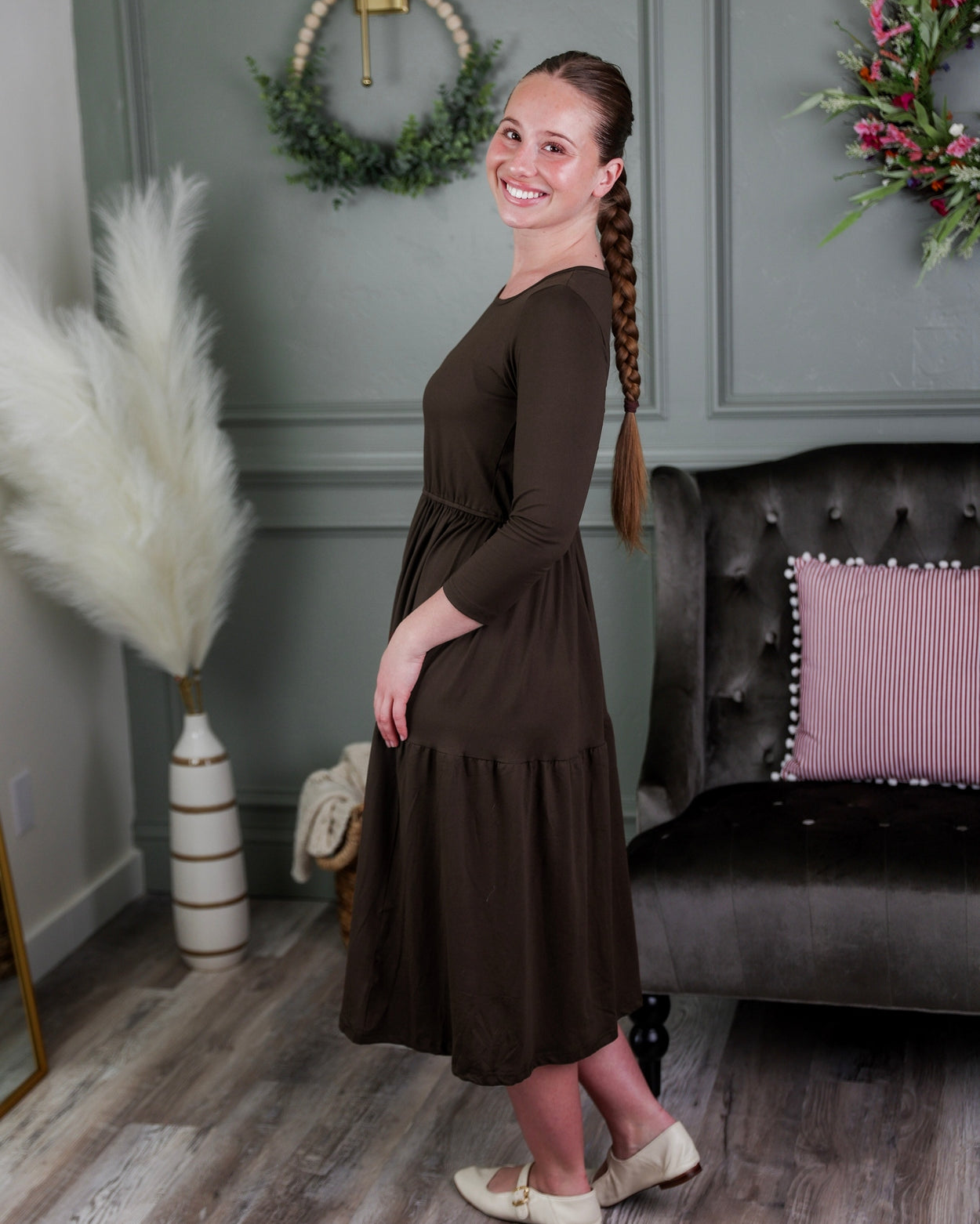 Model wearing Nuggles® Nova Dress in Brown