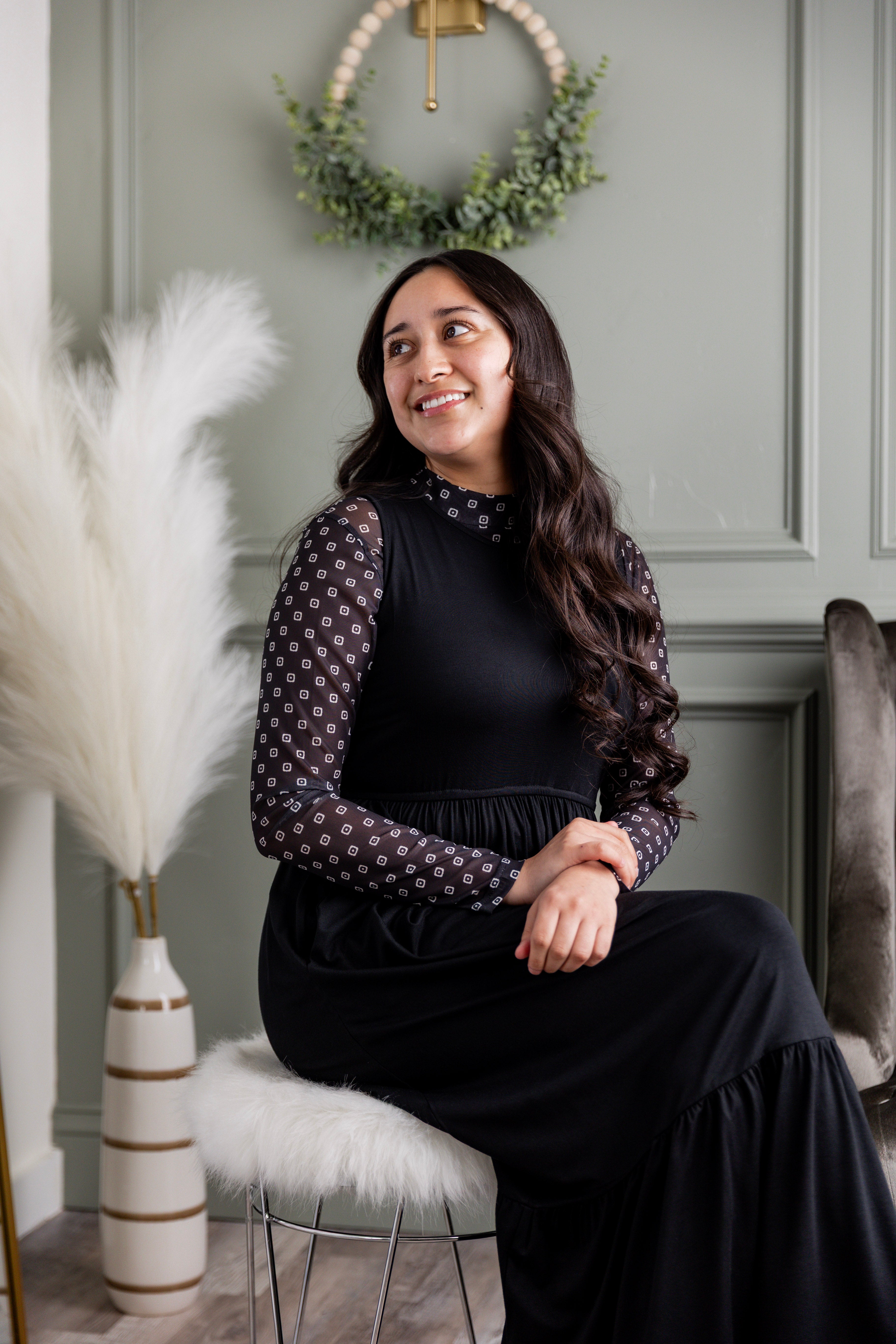 Model wearing the Nuggles® Riley Dress in Black