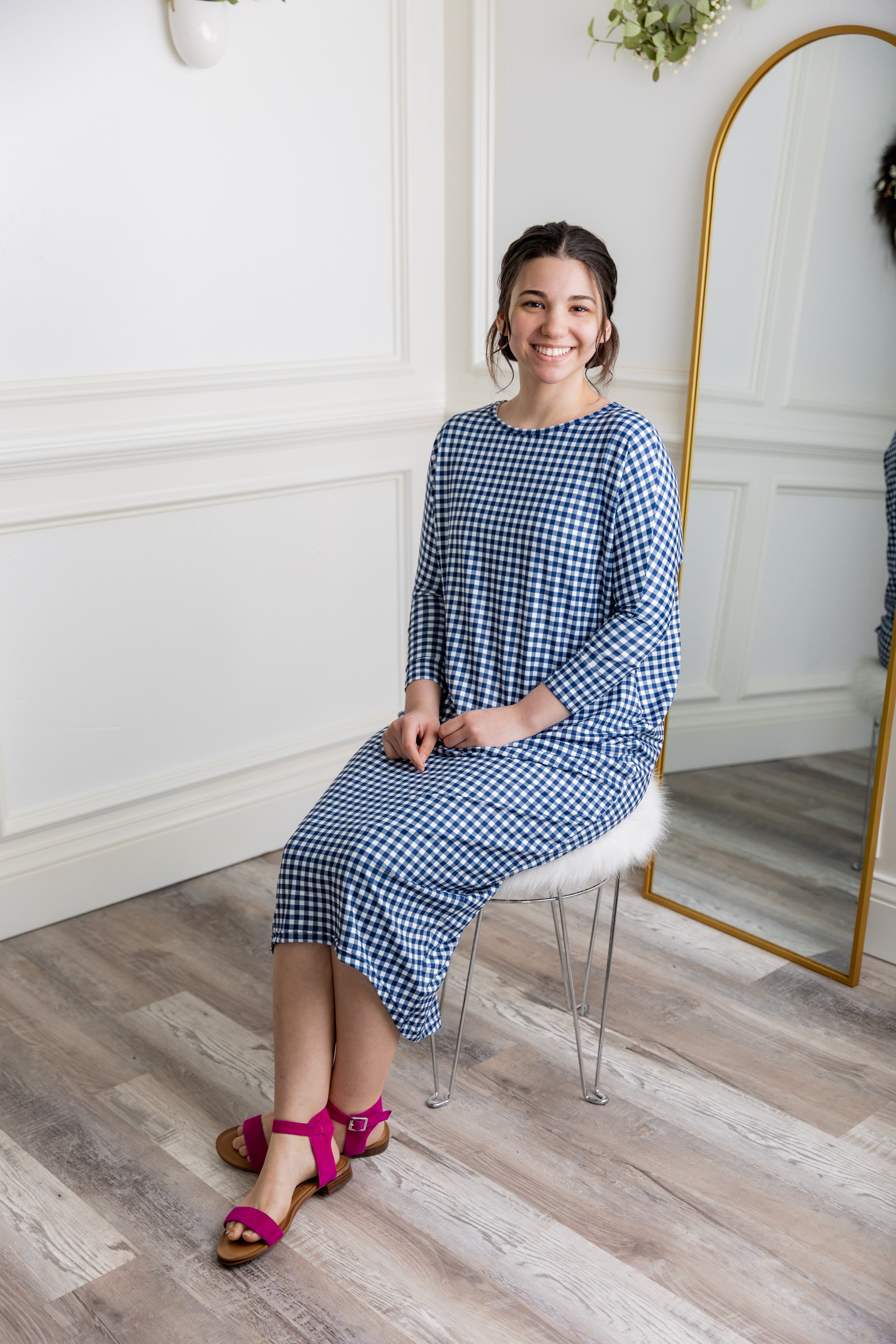Modest dolman sleeve dress for women with relaxed fit and tapered hem, made from soft stretch knit fabric – perfect for everyday wear.