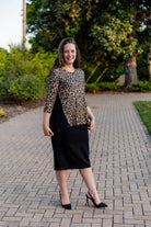 Model wearing the Adrielle Top with 3/4 sleeves and a classic skirt – modest women's top from Nuggles®