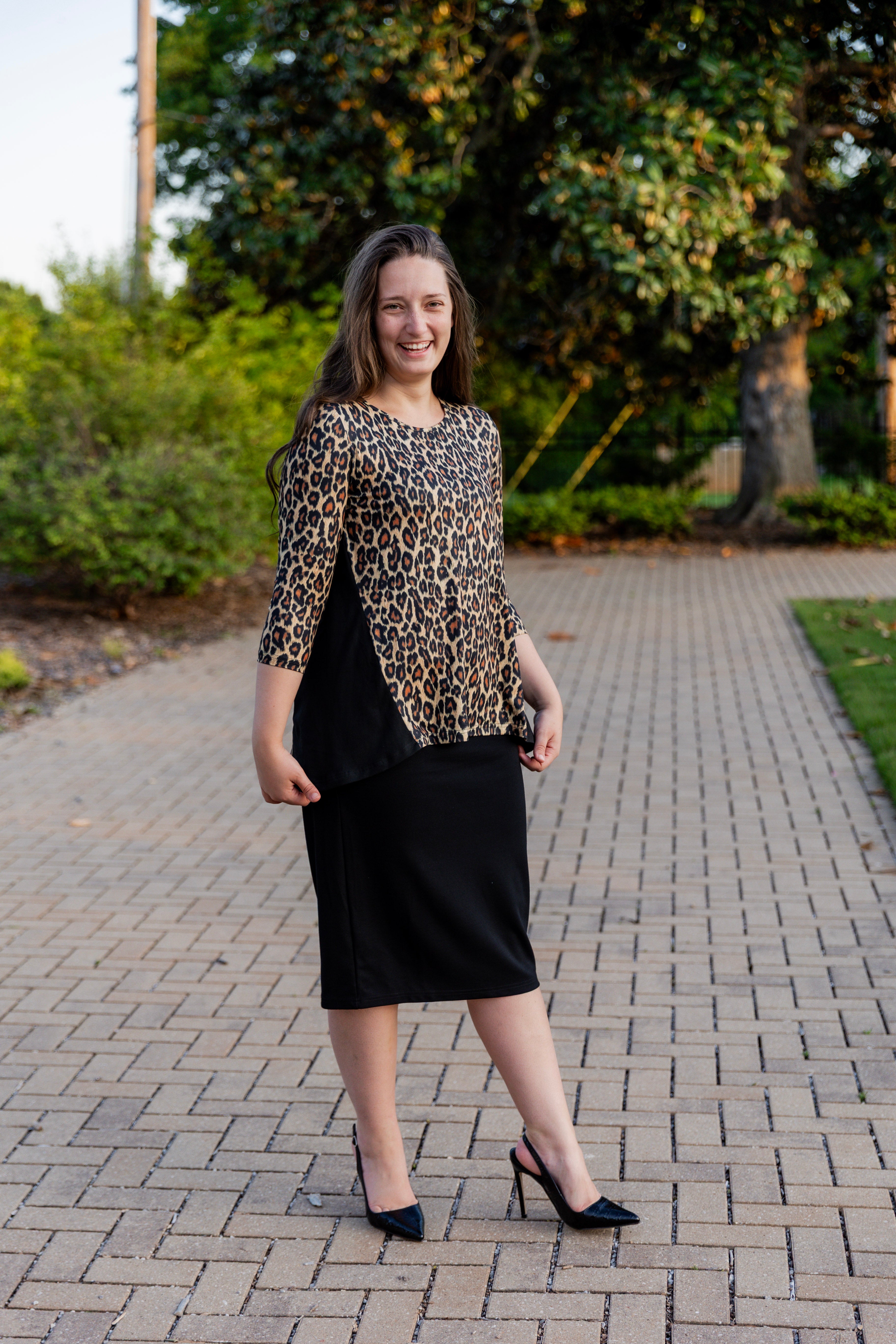 Model wearing the Adrielle Top with 3/4 sleeves and a classic skirt – modest women's top from Nuggles®