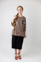 Modest women's Paisley Top with 3/4 sleeves, front pocket, and contrast knit fabrics, styled with a classic skirt – perfect for everyday wear or church outfits