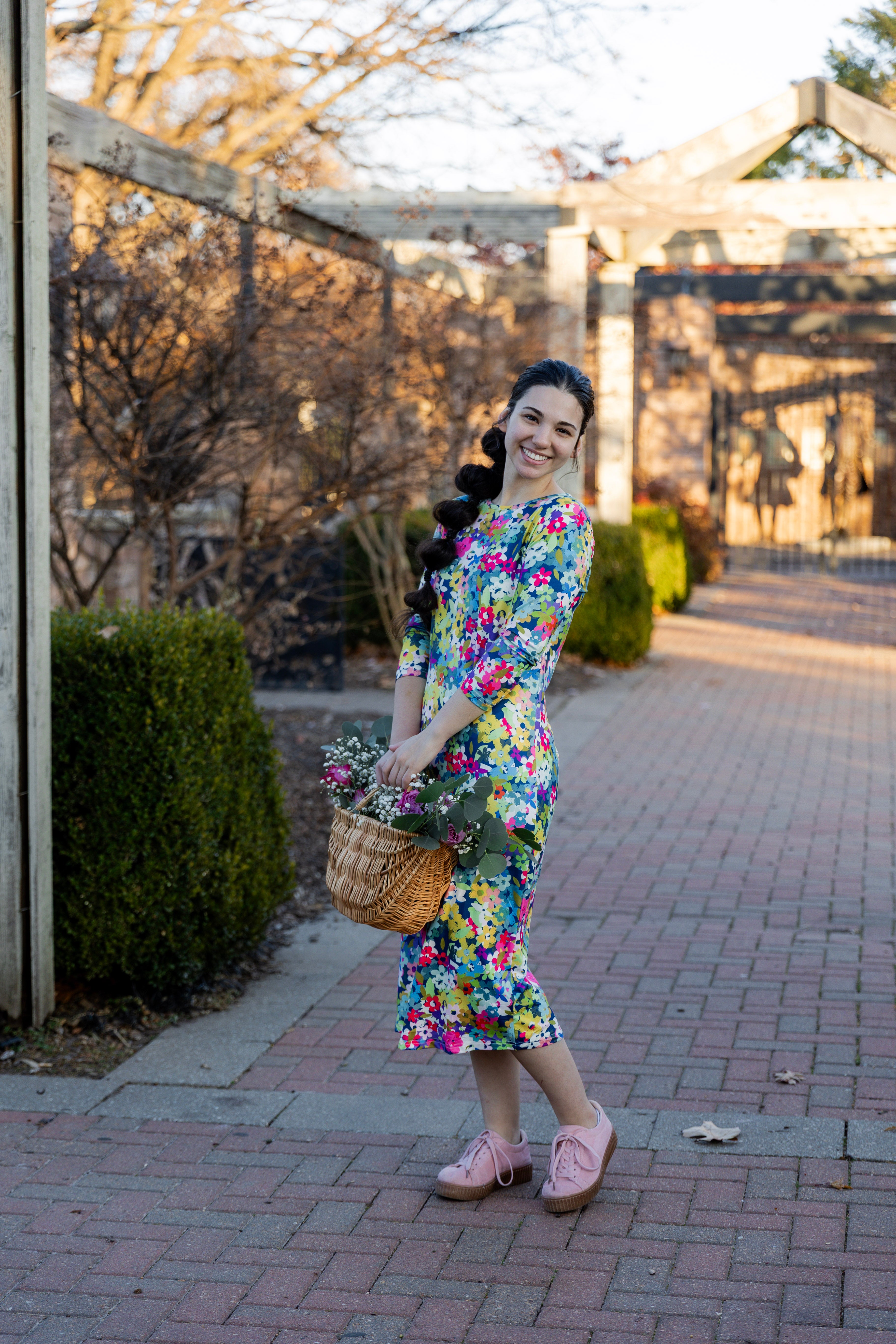 Model wearing the Nuggles® Original Midi Layering Dress in Wildflower Haze