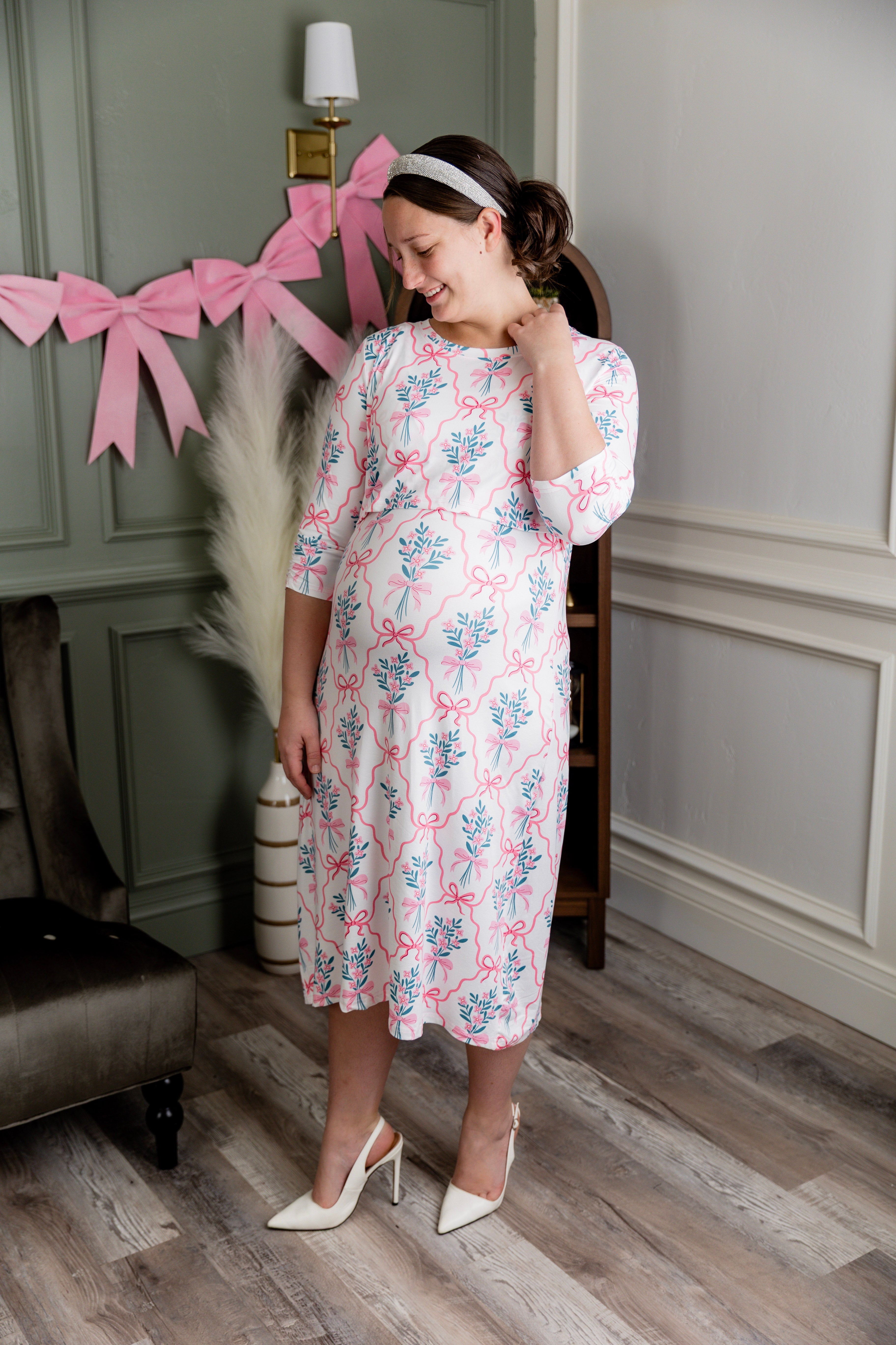 Model wearing Nuggles® Nalani Nursing Dress in Pixie Petals