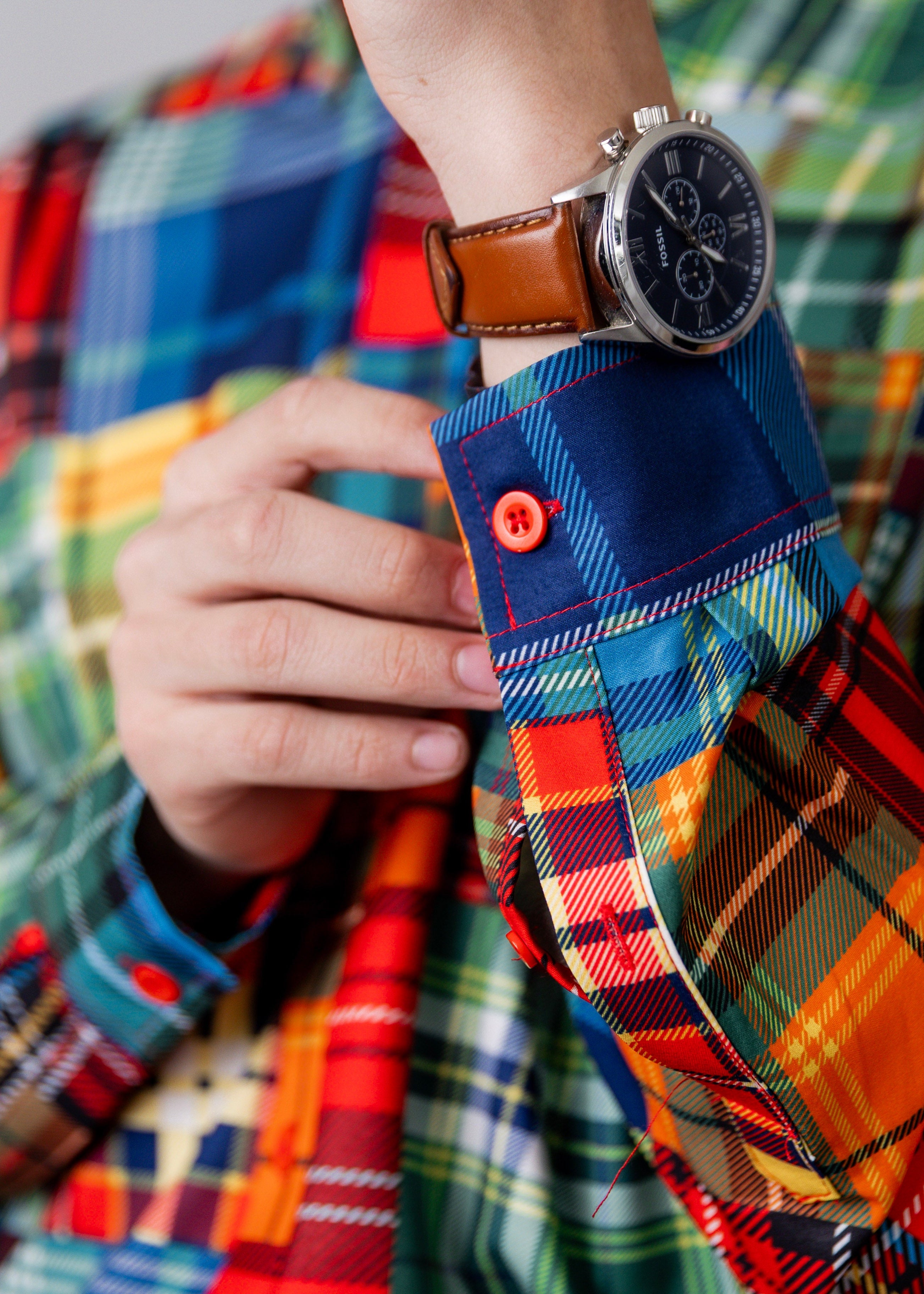 Model wearing Nuggles® Men's Button Down Shirt in Patch Plaid