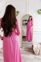 Nuggles® Cleo modest maxi dress in various prints shown with hidden pockets and fitted bodice.