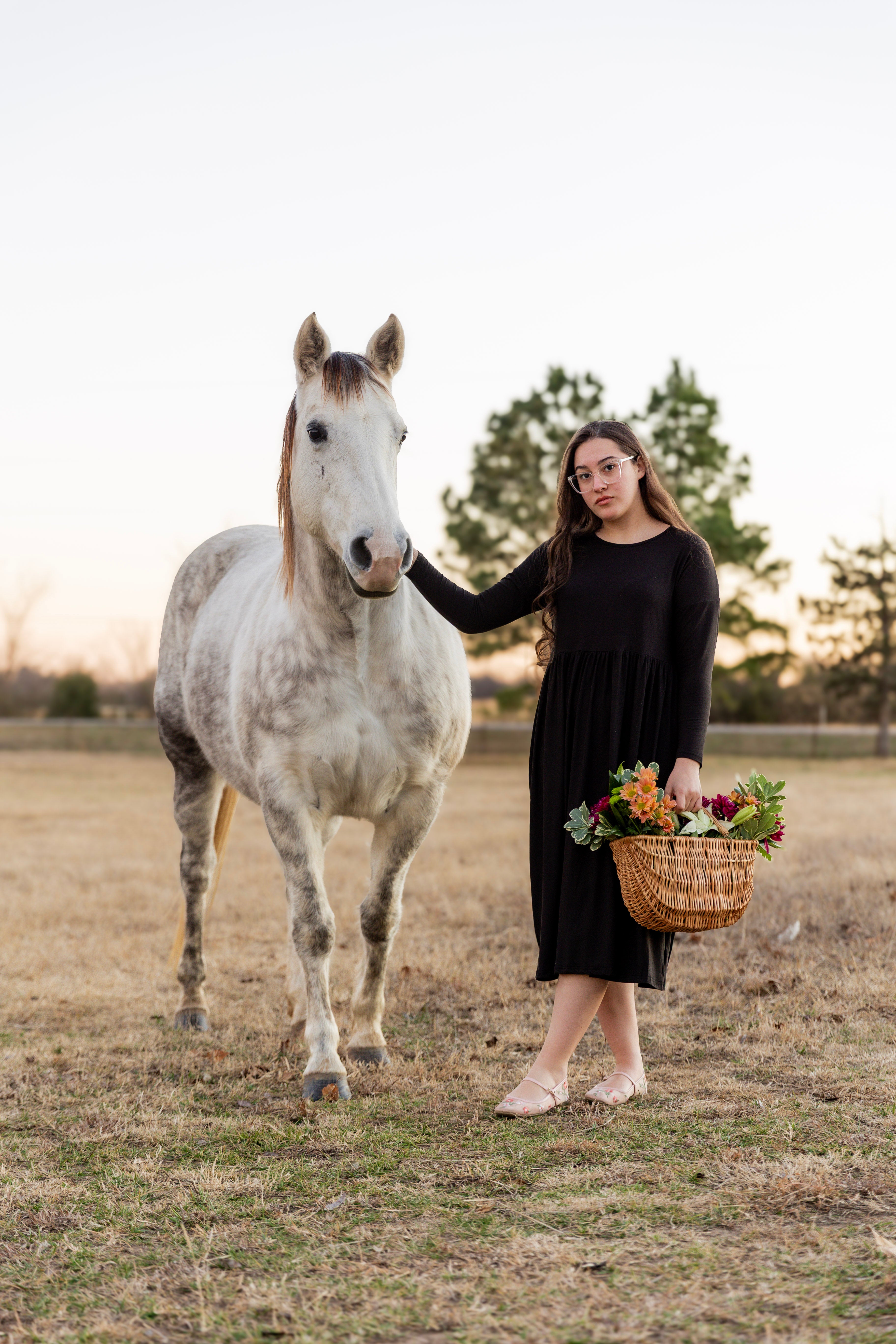 Model wearing the Nuggles® Farah Dress in Black