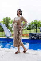 Modest activewear skirt with built-in leggings for women, breathable athletic fabric, paired with sneakers – perfect for workouts or casual wear.