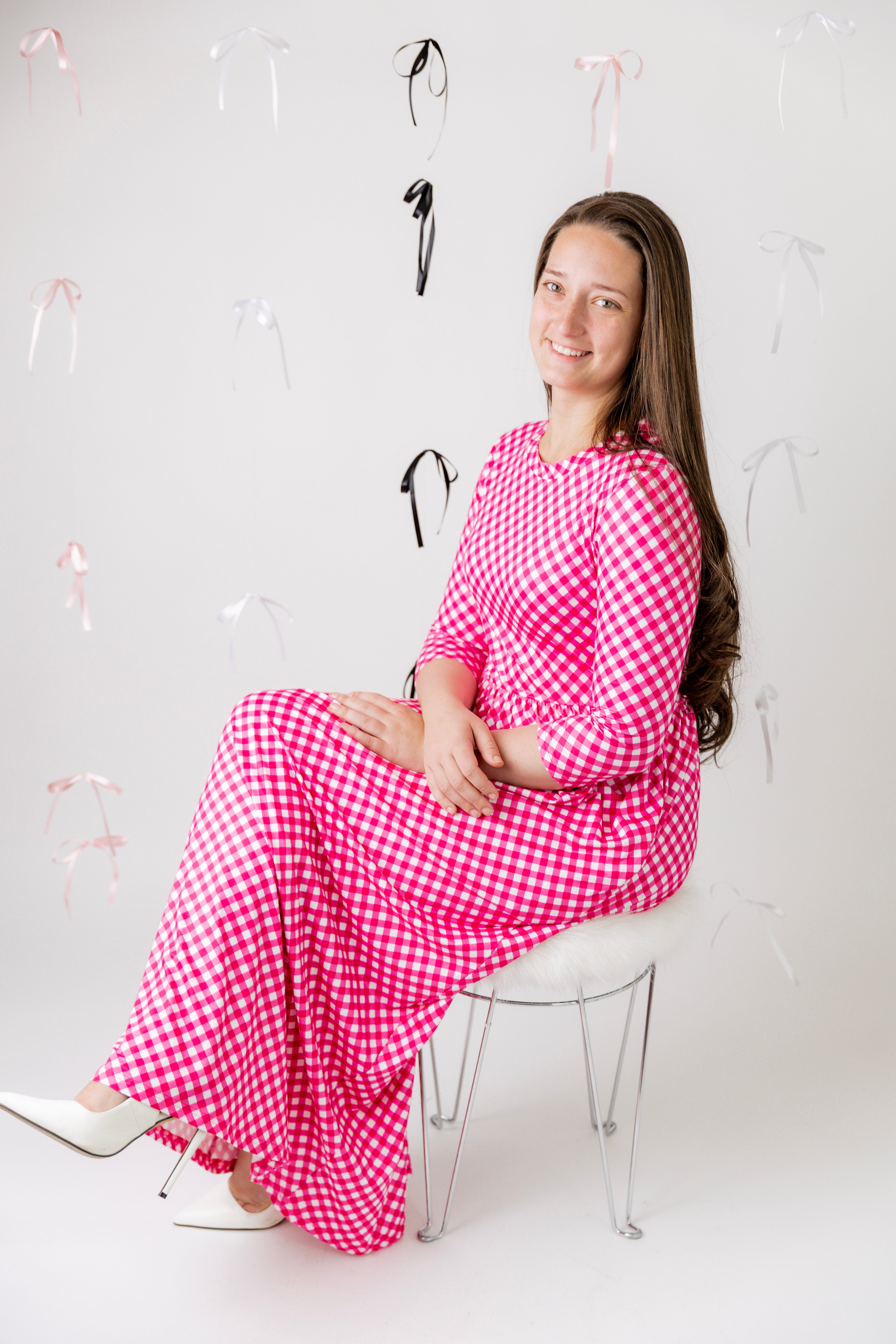 Nuggles® Cleo modest maxi dress in various prints shown with hidden pockets and fitted bodice.