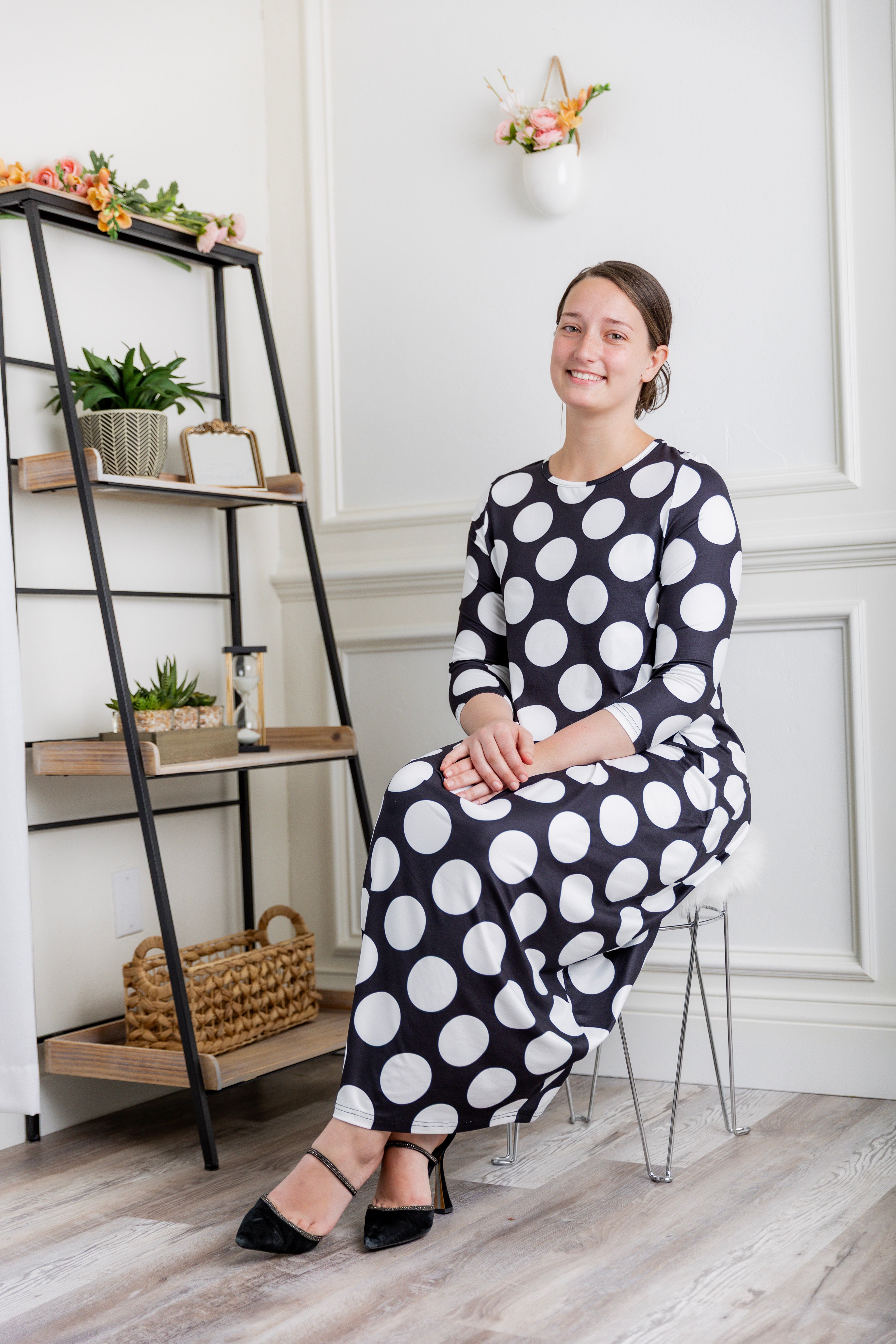 Model wearing Emma Bubble Dress in pretty prints, showcasing full bubble skirt and modest fit.