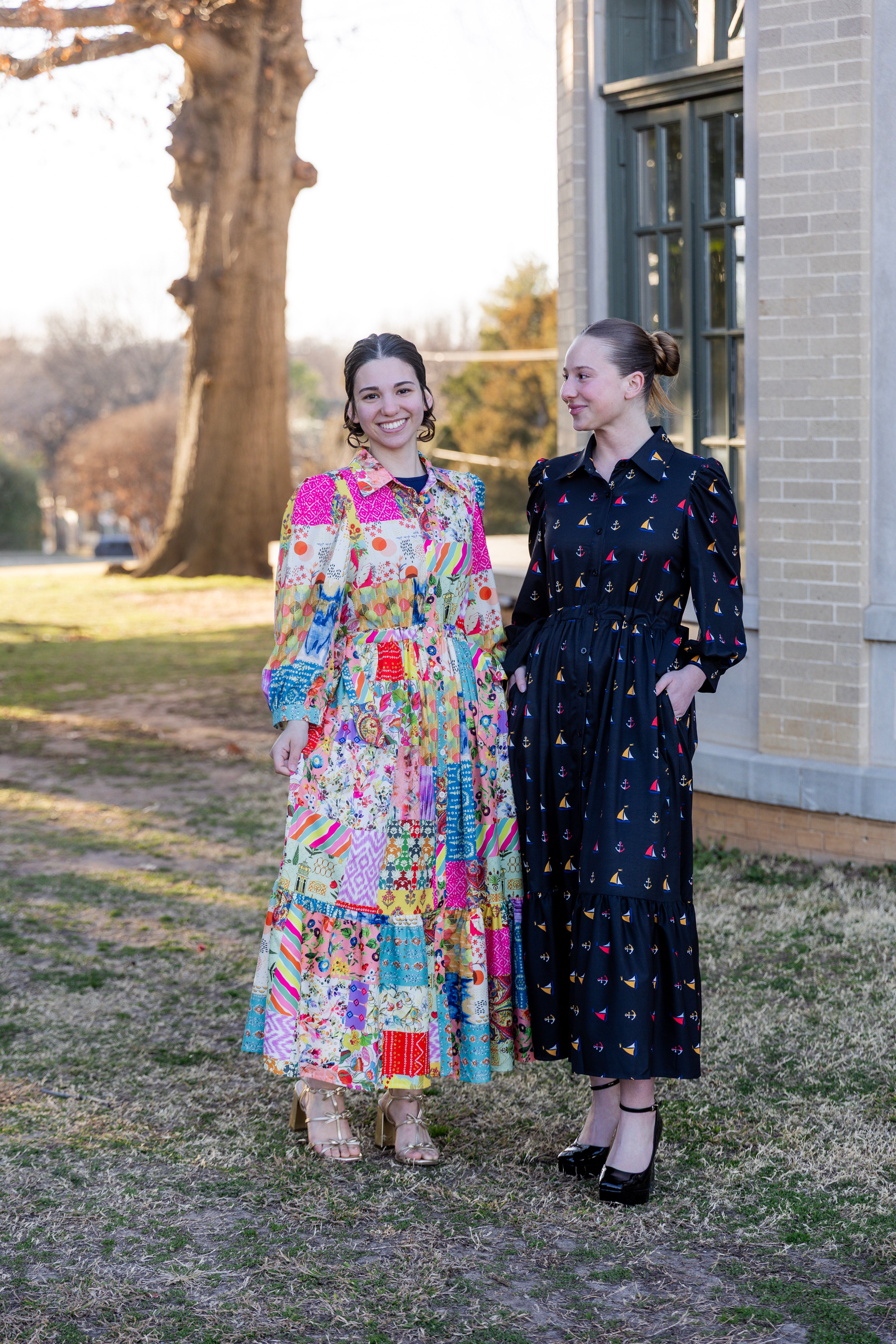 Model wearing the Nuggles® Leila Dress in Keepsake Quilt