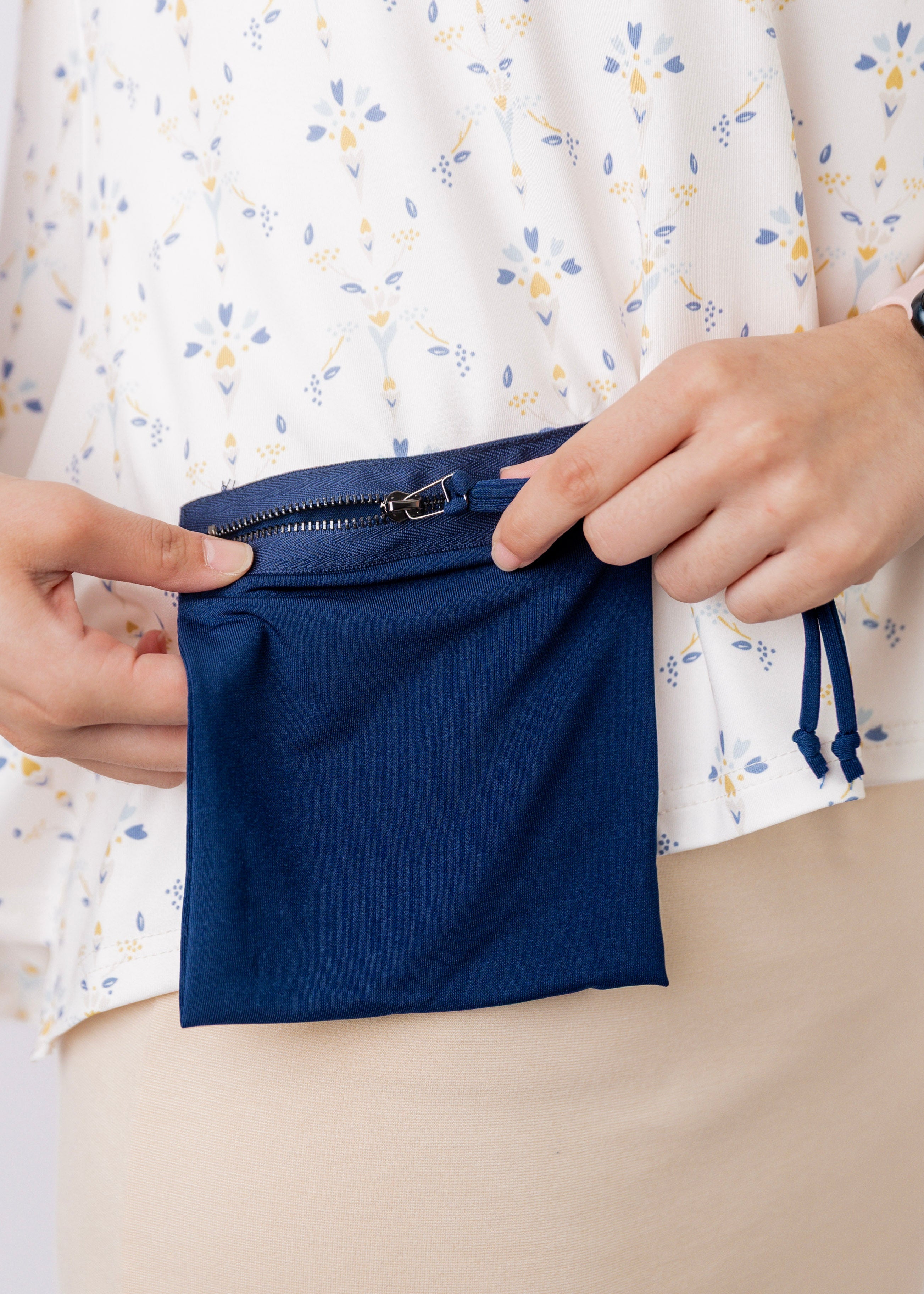 Model wearing the Nuggles® Keegan Top in Dewdrop Ivory floral print modest boutique top