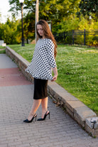 Model wearing the Avery Top, featuring modest 3/4 sleeves and a flowy, flattering fit.