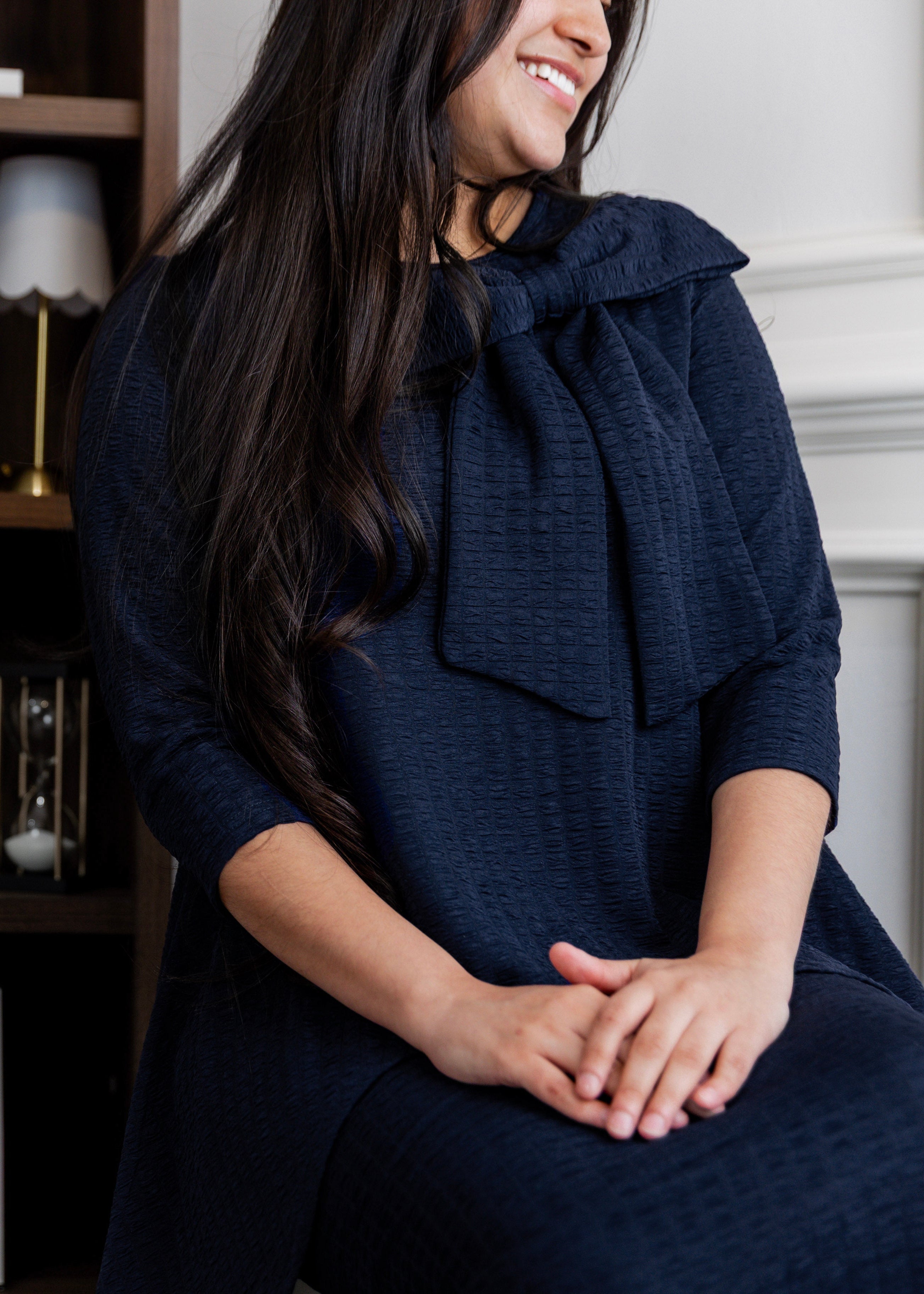 Model wearing Nuggles® Eleanor Top in Navy