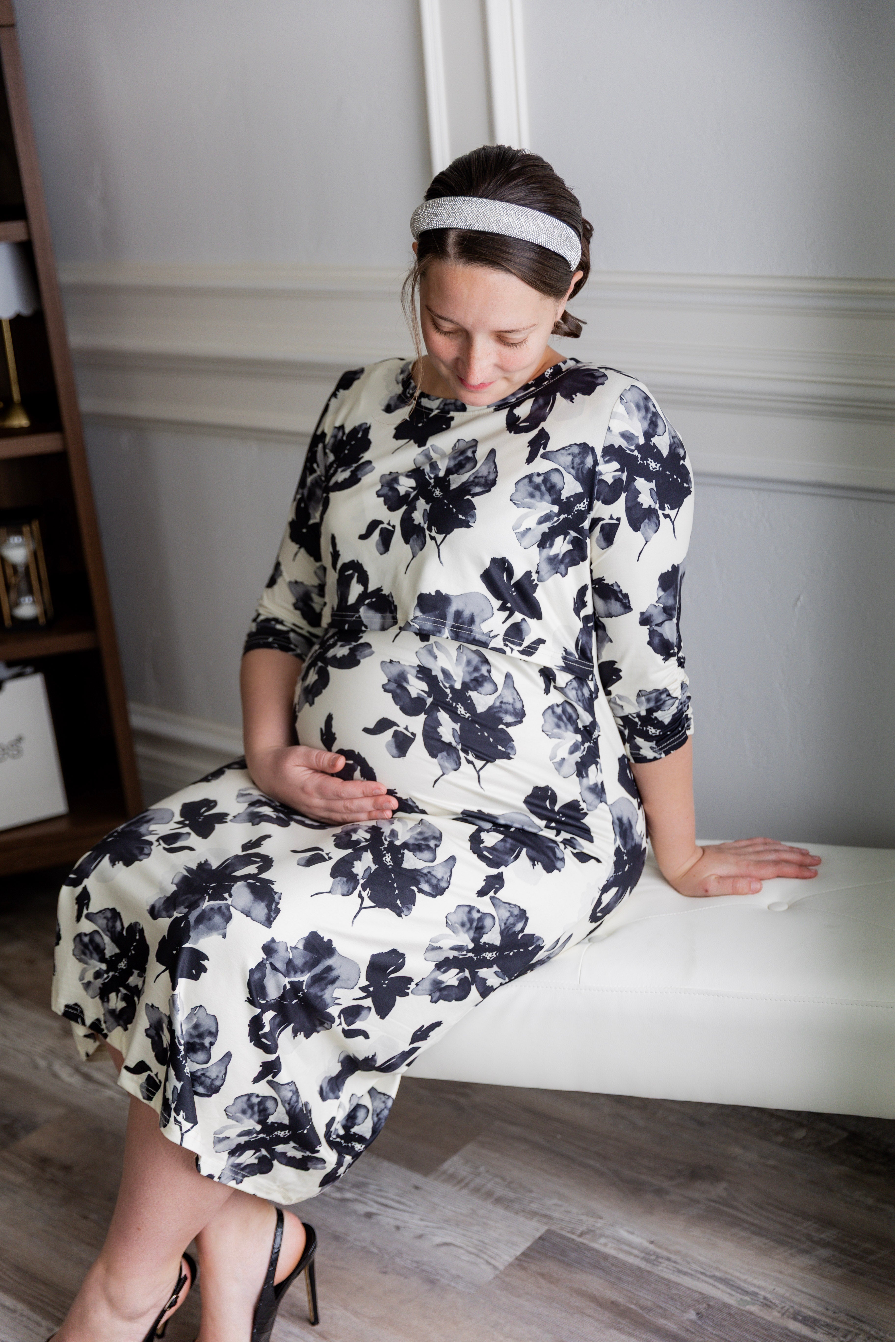 Model wearing Nuggles® Nalani Nursing Dress in Ink Blossom