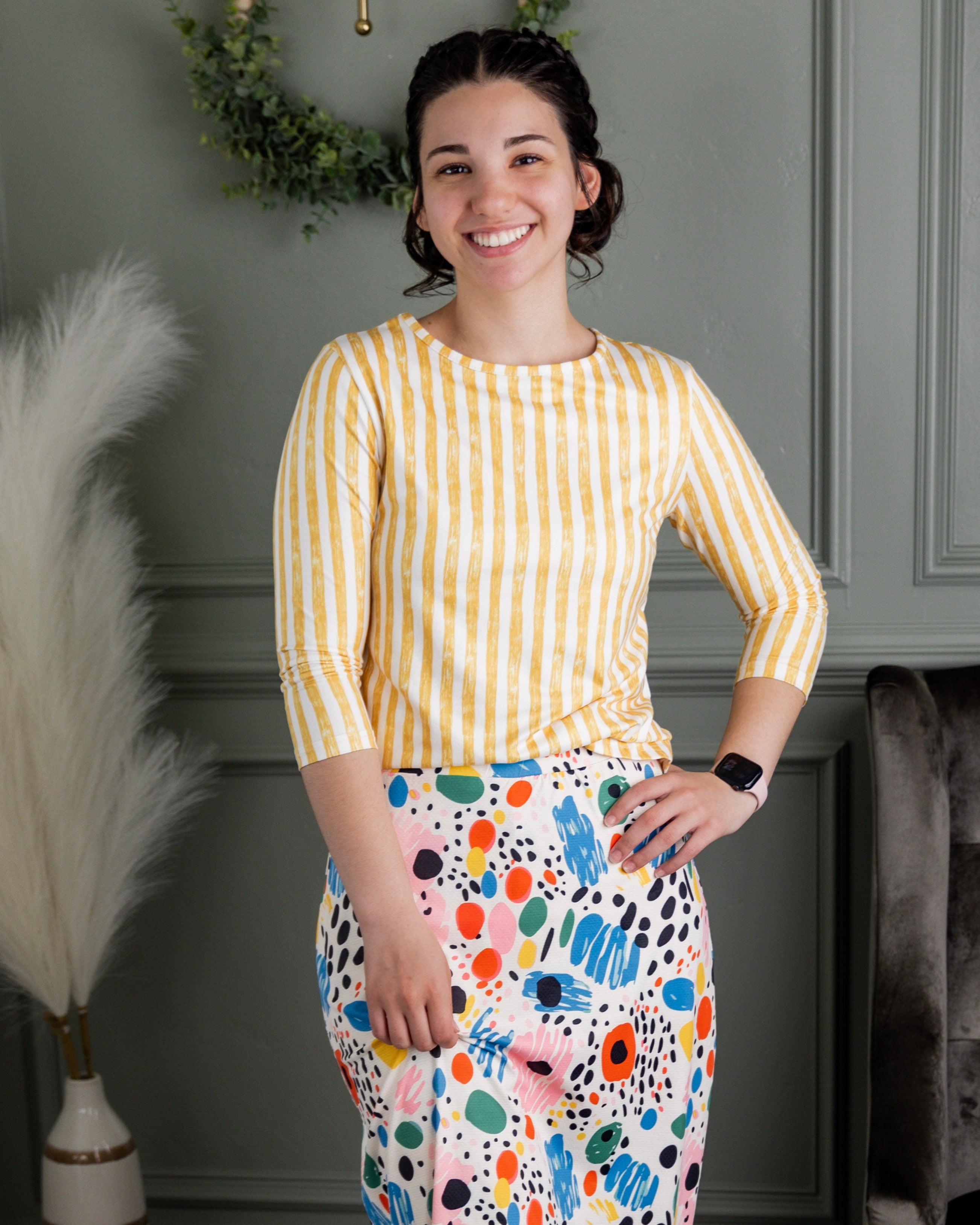 Model wearing Nuggles® 3/4 Essential Tee in Lemon Drop Stripe