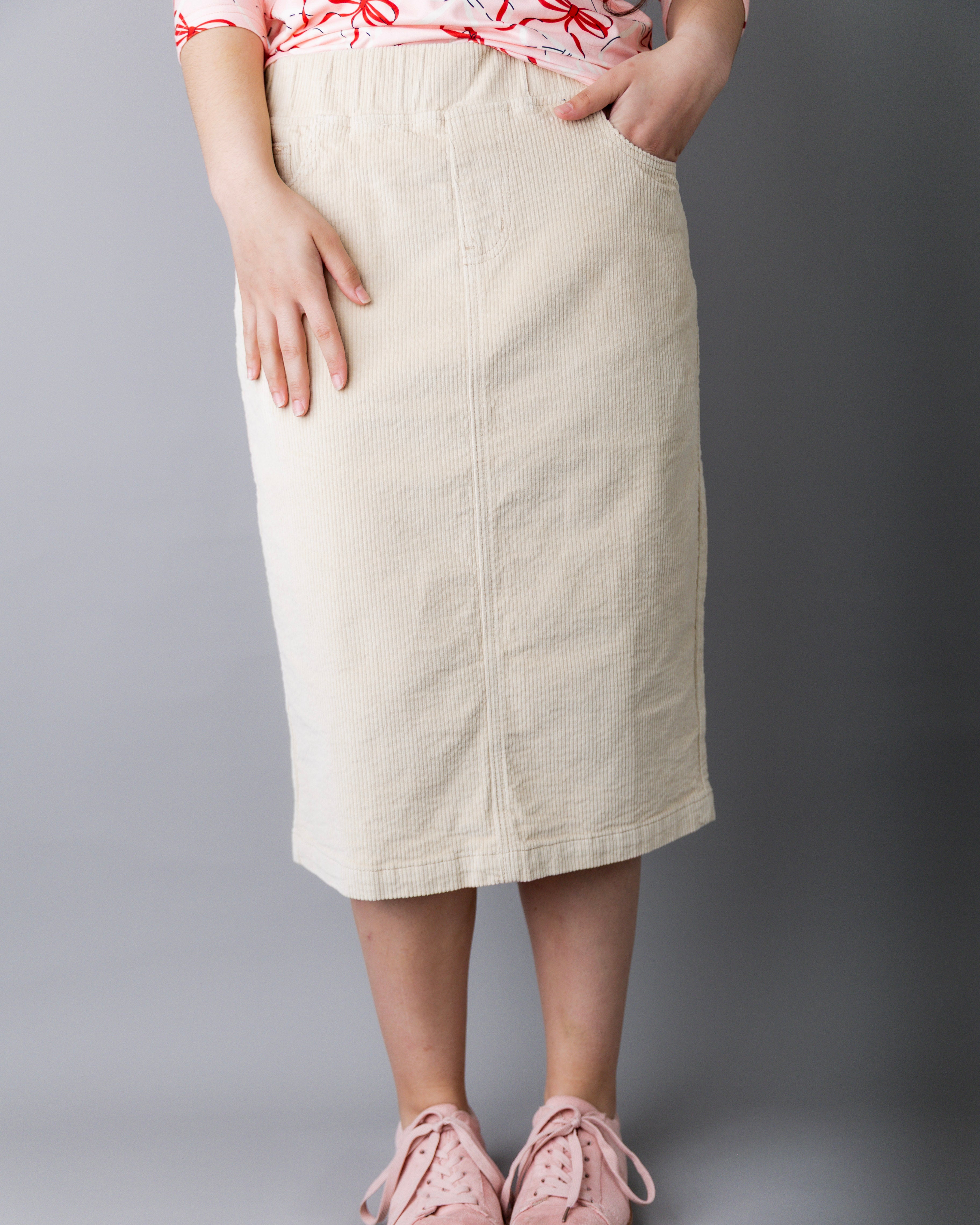 Model wearing Nuggles® 27-inch corduroy skirt