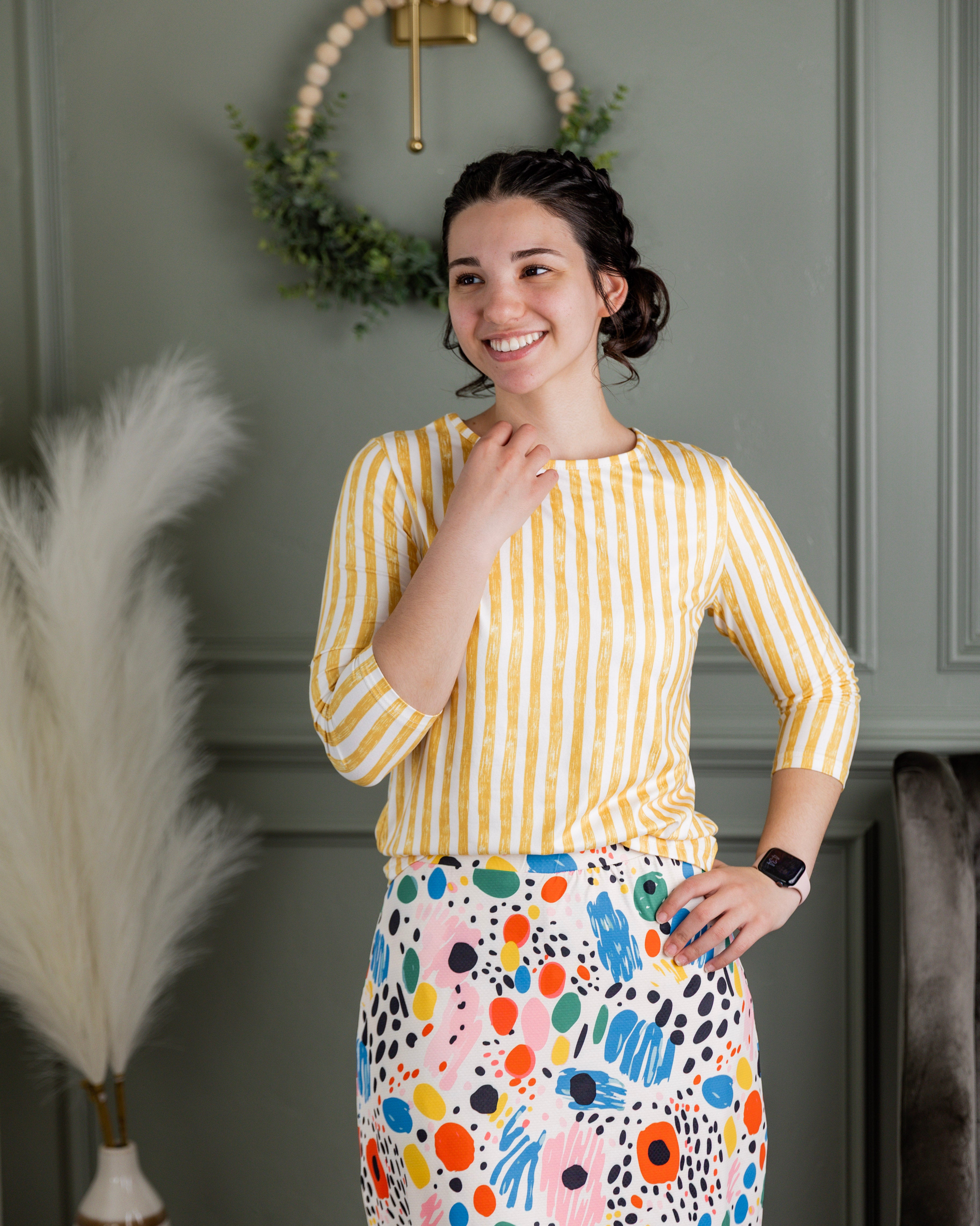 Model wearing Nuggles® 3/4 Essential Tee in Lemon Drop Stripe