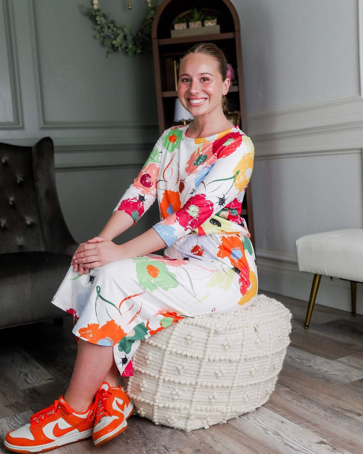 Model wearing Nuggles® Harper Jane Dress in Party Blooms