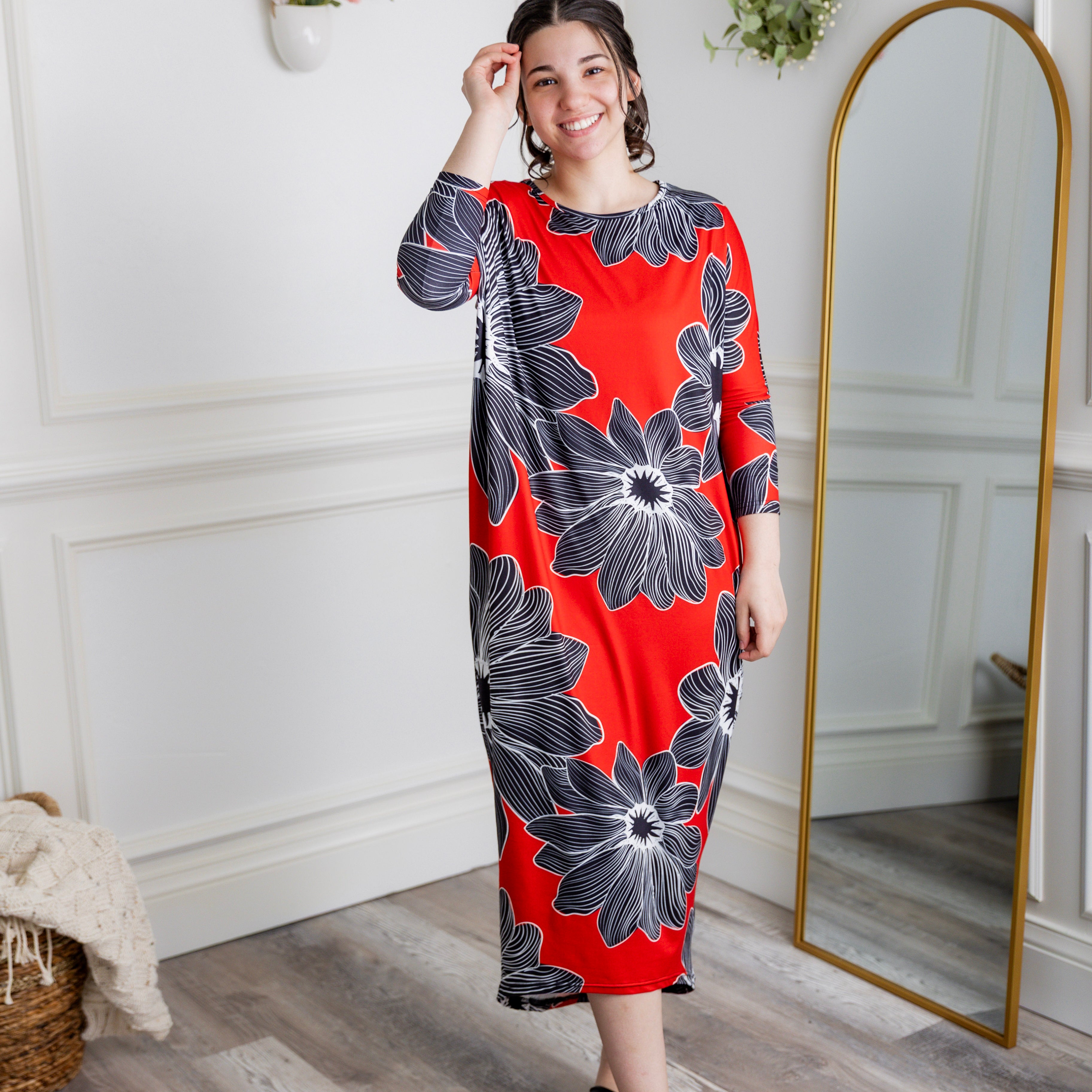 Modest dolman sleeve dress for women with relaxed fit and tapered hem, made from soft stretch knit fabric – perfect for everyday wear.