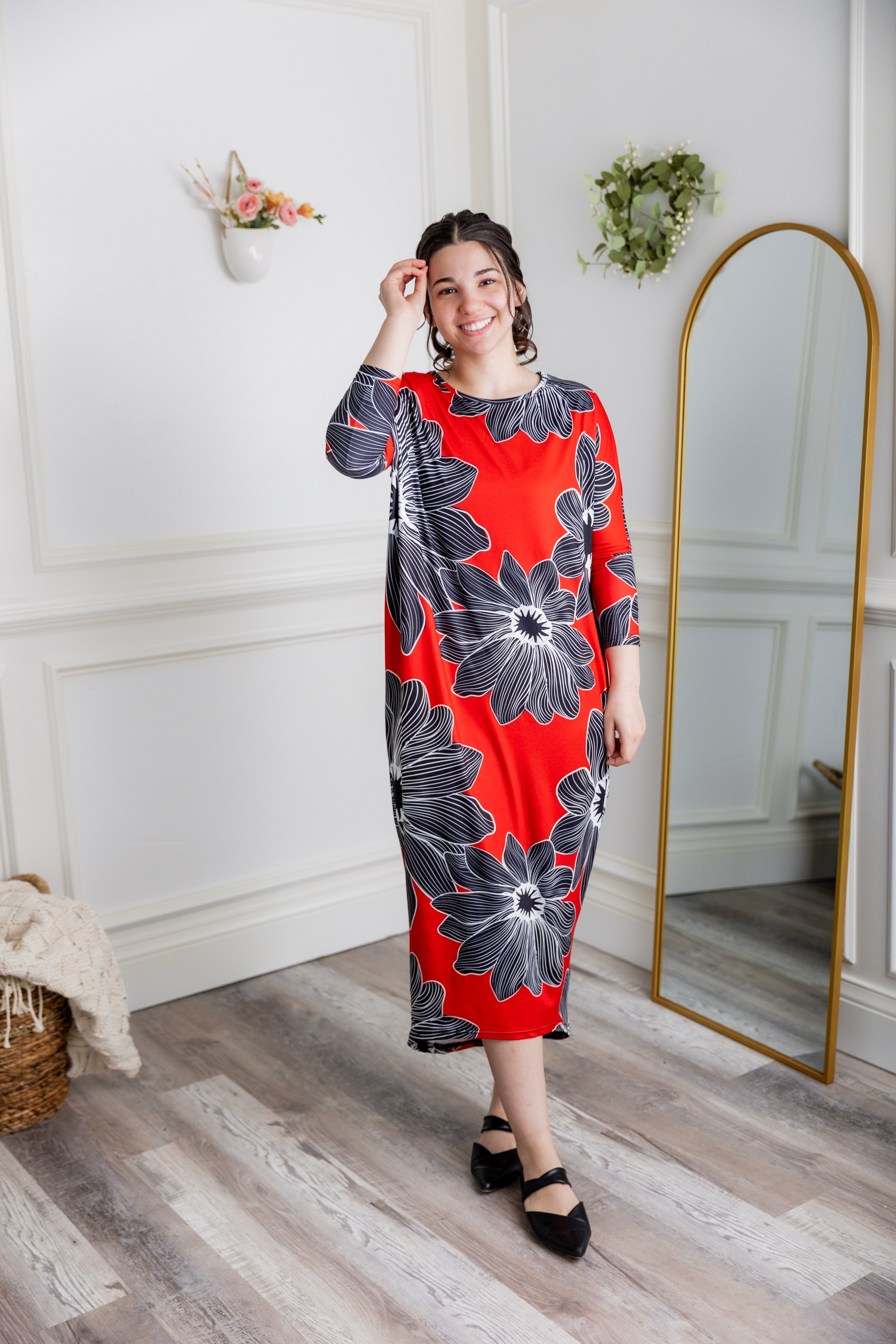 Modest dolman sleeve dress for women with relaxed fit and tapered hem, made from soft stretch knit fabric – perfect for everyday wear.