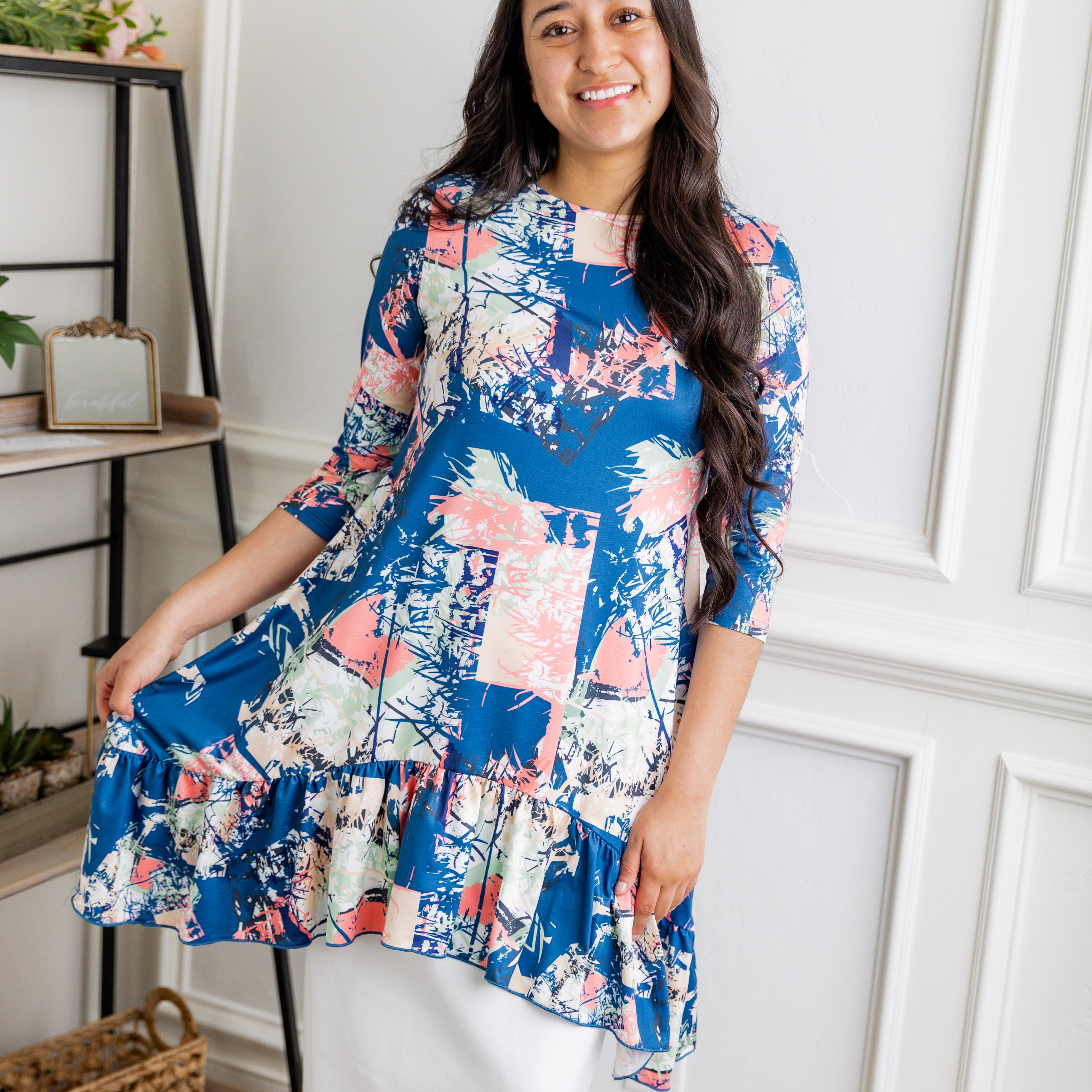 Bright abstract print tunic top for women – Nuggles® Rose Top with blue, pink, and cream splashes, modest and flowy fit.