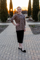 Modest women's Paisley Top with 3/4 sleeves, front pocket, and contrast knit fabrics, styled with a classic skirt – perfect for everyday wear or church outfits